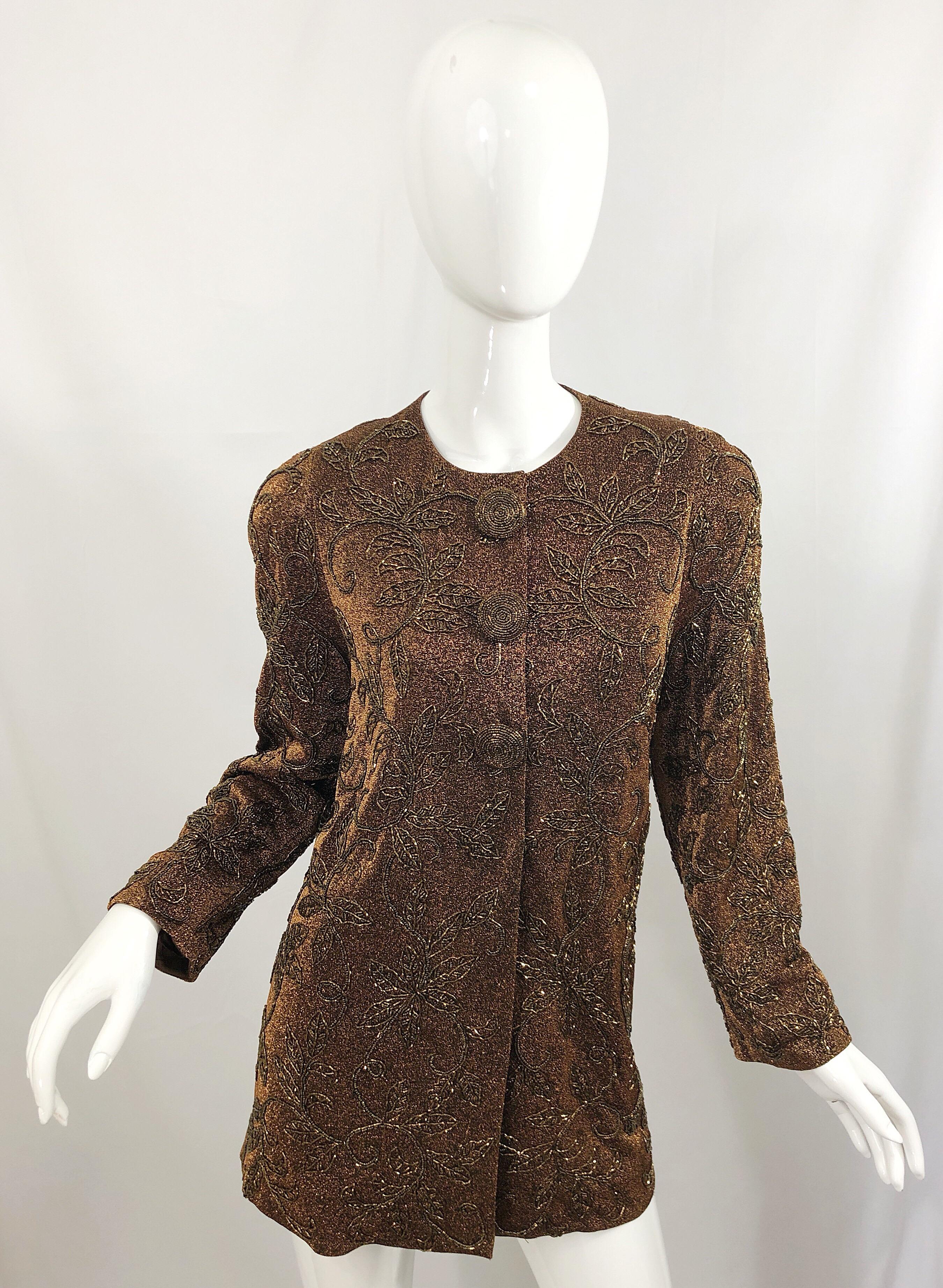 Beautiful 1990s CARMEN MARC VALVO bronze / gold metallic beaded jacket! Features thousands of hand-sewn bronze beads throughout. Large intricately beaded mock buttons feature hidden heavy duty snaps. Fully lined. Can easily be dressed up or down.