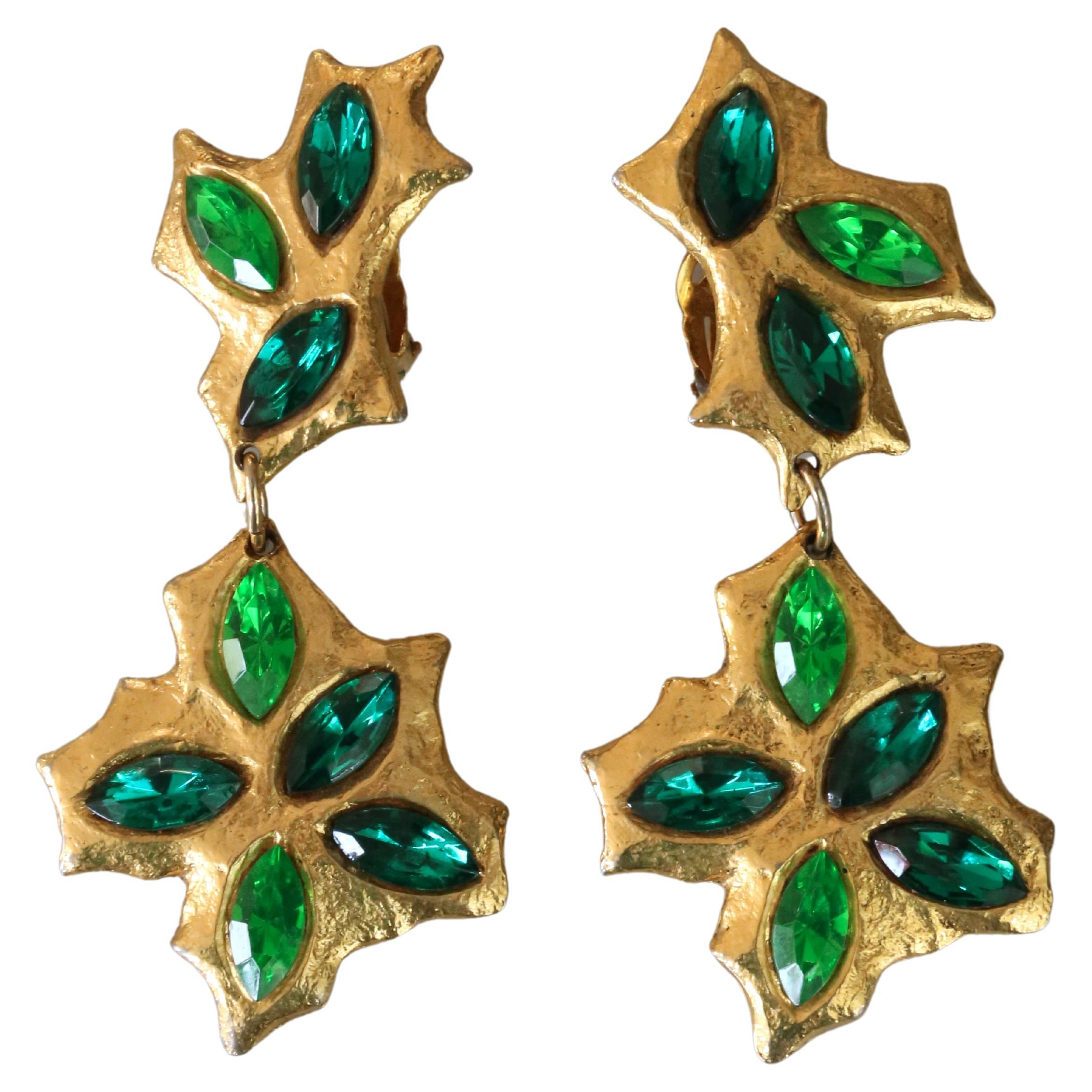 Superb vintage long clips earrings from French designer Carole Saint Germes who created for the fashion shows of the Givenchy couturiers, Feraud, Ungaro, and Jean Charles de Castelbajac. Earrings are gold plated and feature a lighter and darker tone