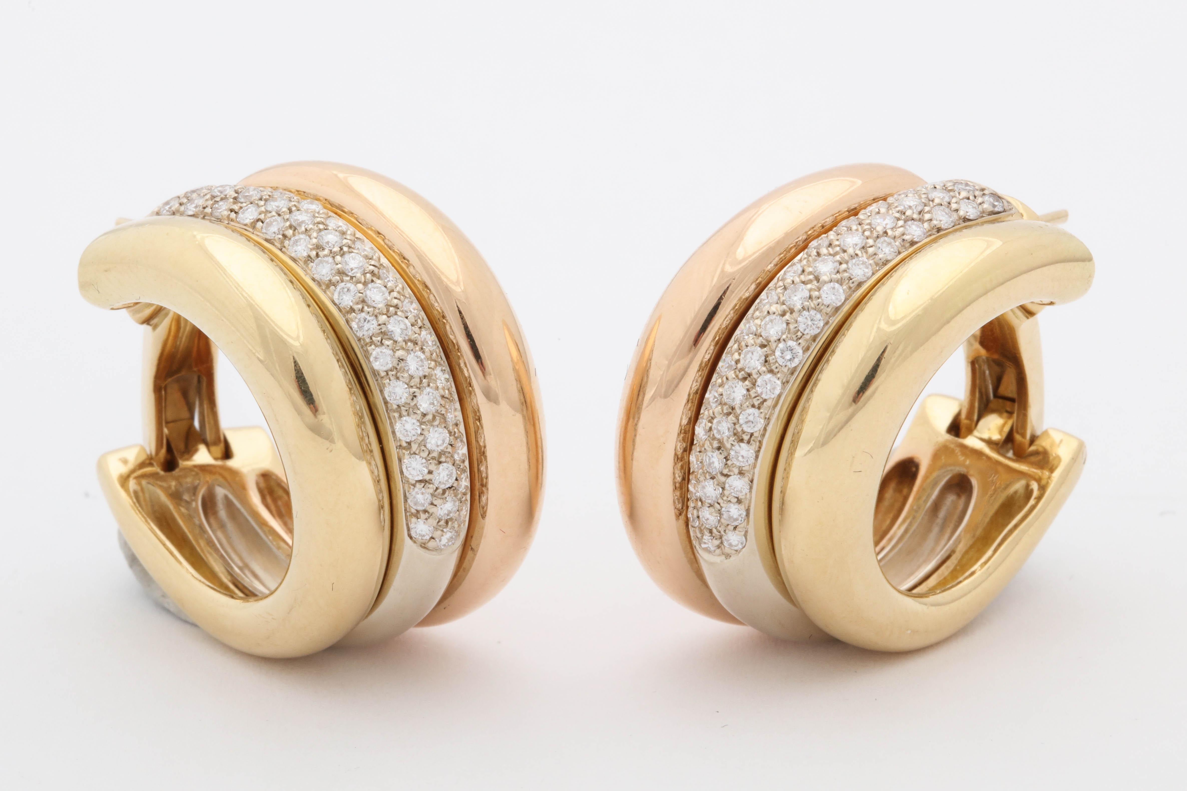One Pair Of Ladies Tri Color 18kt Gold Earrings Made With Pink ,Yellow And White Gold Half Hoop Design Loops Embellished With Numerous High Quality Full Cut Diamonds Weighing Approximately 3 Carats Total Weight. Designed By Cartier Made In France In