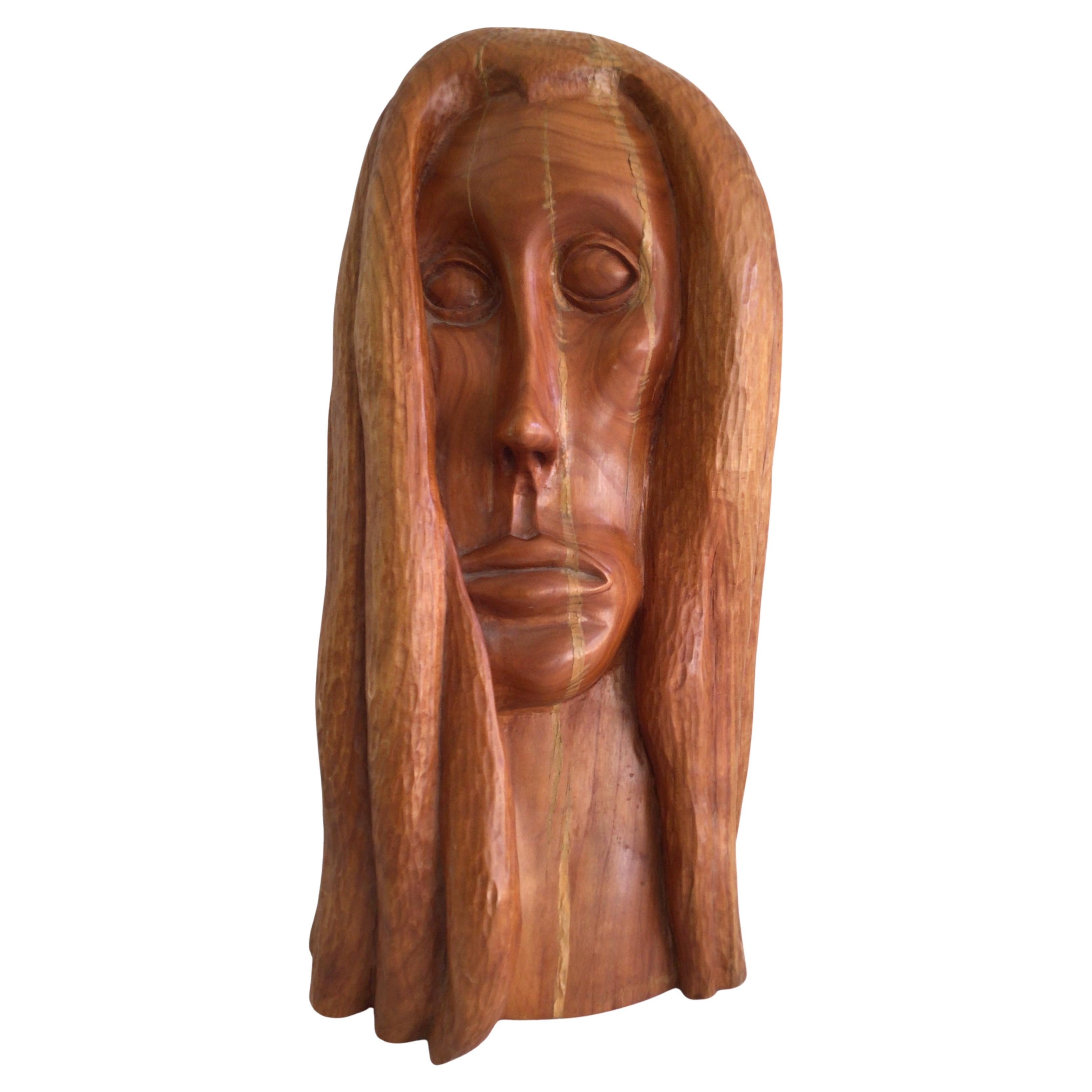Scultura in legno intagliato degli anni 
90 raffigurante una testa di donna