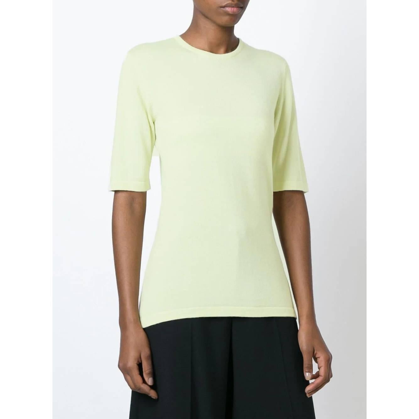 Céline mint green cashmere and silk blend sweater. Round neck and short sleeves. 

Years: 90s

Made in Italy

Size: 3


Flat measurements

Height: 67 cm
Shoulders: 38 cm 
Bust: 42 cm
Sleeves: 31 cm
