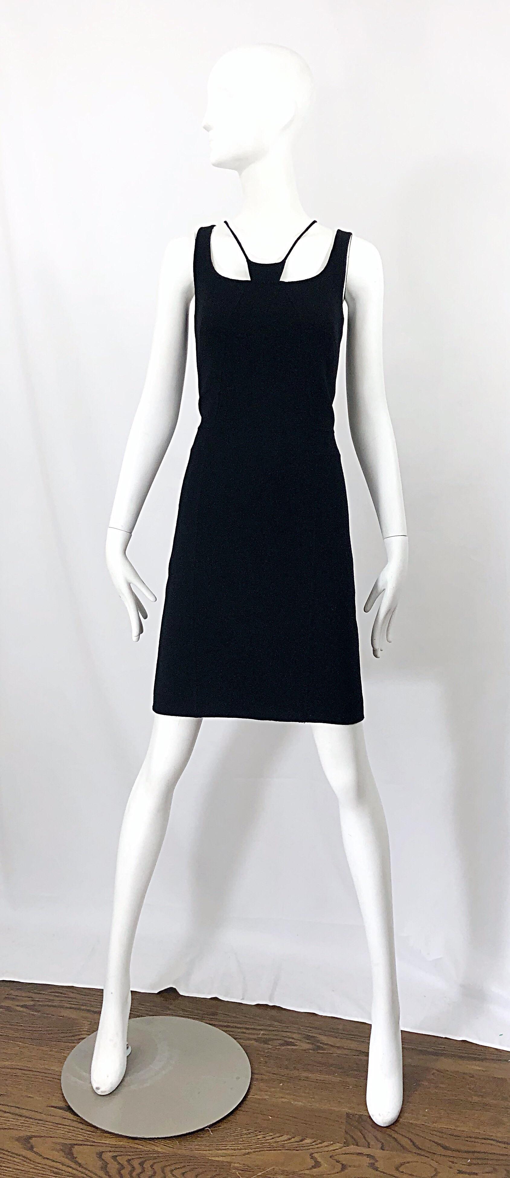 Rare early vintage work by CHADO RALPH RUCCI! The classic little black dress, with a slight edge. Bondage inspired neck. Hidden curved zipper up a side back seam. Lightweight wool is perfect for any time of year. Fully lined. Couture quality one