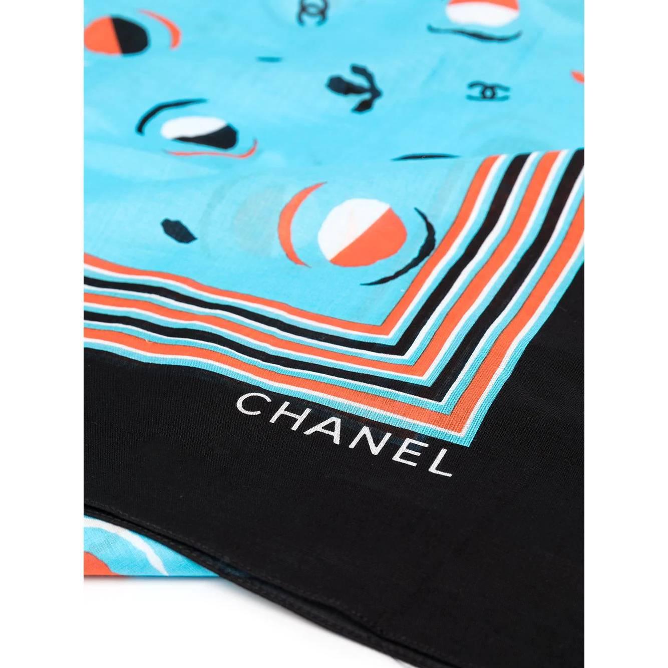 A.N.G.E.L.O. Vintage - ITALY
Chanel light blue cotton scarf with abstract print in shades of black, white and orange and CC logos.

Years: 90s

Made in Italy

Measurements: 105 x 150 cm
