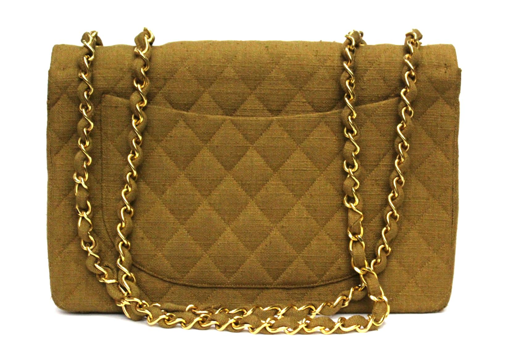 Chanel Maxi Jumbo Vintage
Beige Canvas 
Gold Hardware
Very good condition
