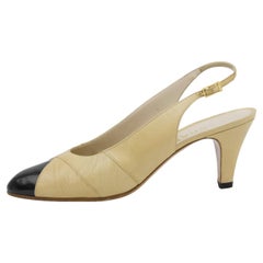 1990s Chanel Beige Leather Sling Back Heels with Black Patent Leather Cap Toe