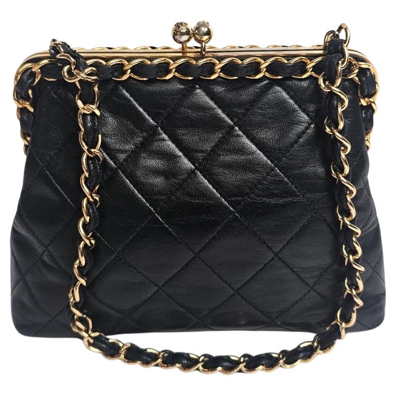 1990s Chanel Black Lambskin Gold Chain-Trimmed Kiss-Lock Purse