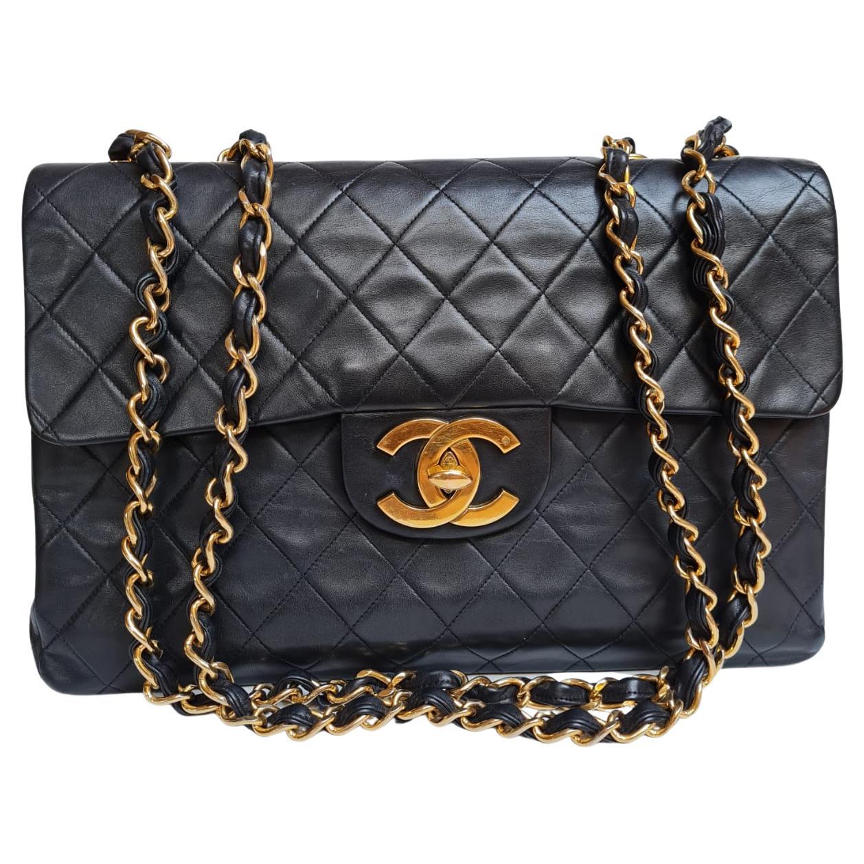 1990s Chanel Black Lambskin Leather Maxi Flap Bag