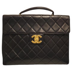 1990s Chanel black leather 24kt gold plated hardware 24h handlebag