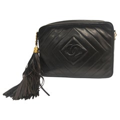 1990s Chanel black leather 24kt gold plated hardware shoulder bag