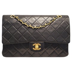 1990s Chanel black leather 24kt gold plated hardware timeless 2.55 shoulder bag