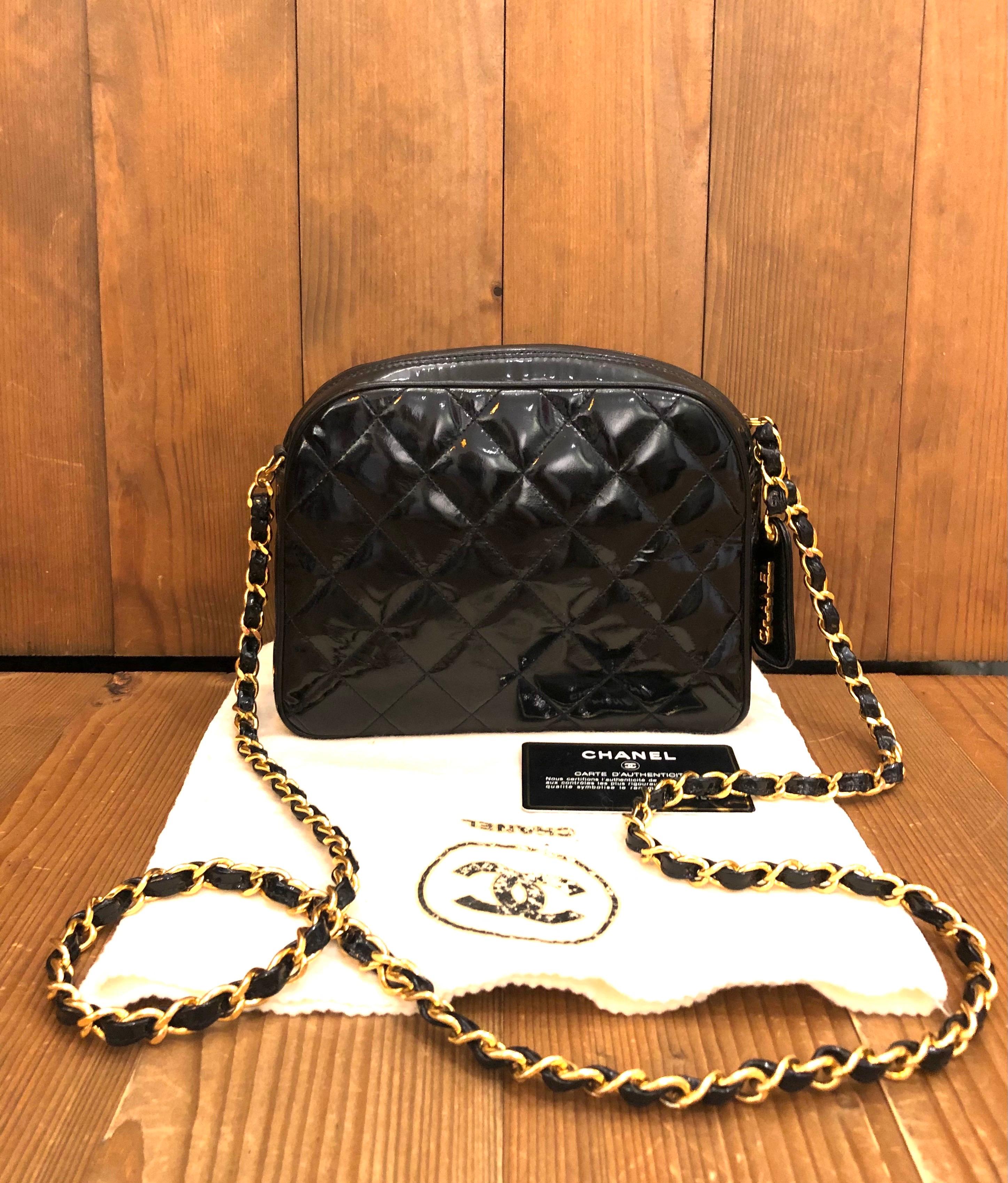 1995-1996 Chanel small chain crossbody bag in black quilted leather. Made in Italy 3 series. Measures approximately 18 x 15 x 7cm Chain 116cm. One interior zip and one interior open pocket. Comes with dust bag and authentication