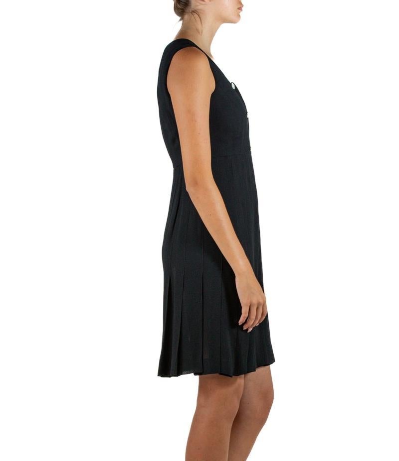 1990S Chanel Black Rayon & Silk Crepe Dress With Mother Of Pearl Logo Buttons In Excellent Condition For Sale In New York, NY