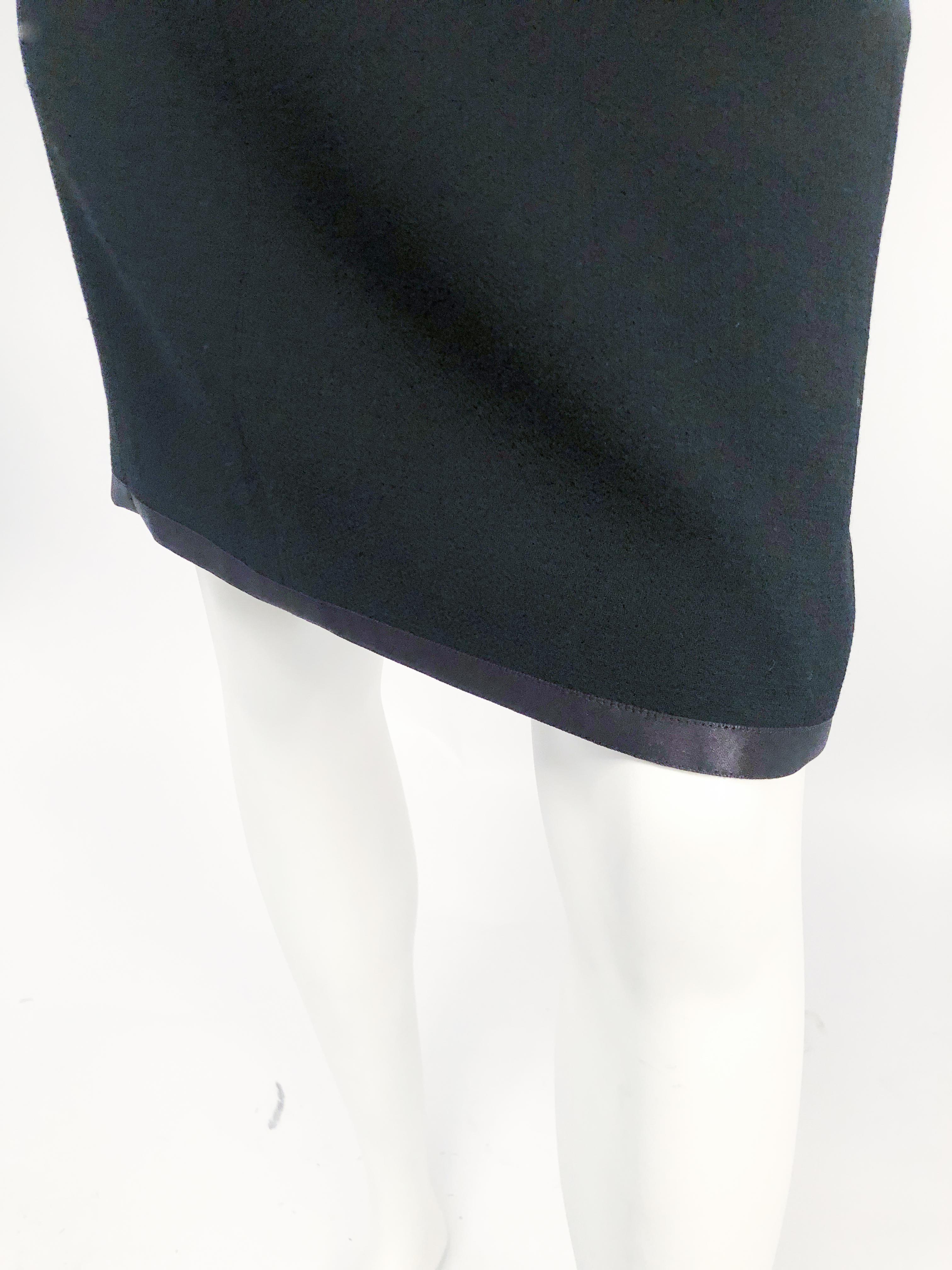 1990s Chanel Black Wool Skirt with Satin Hem and Silk Lining In Good Condition For Sale In San Francisco, CA