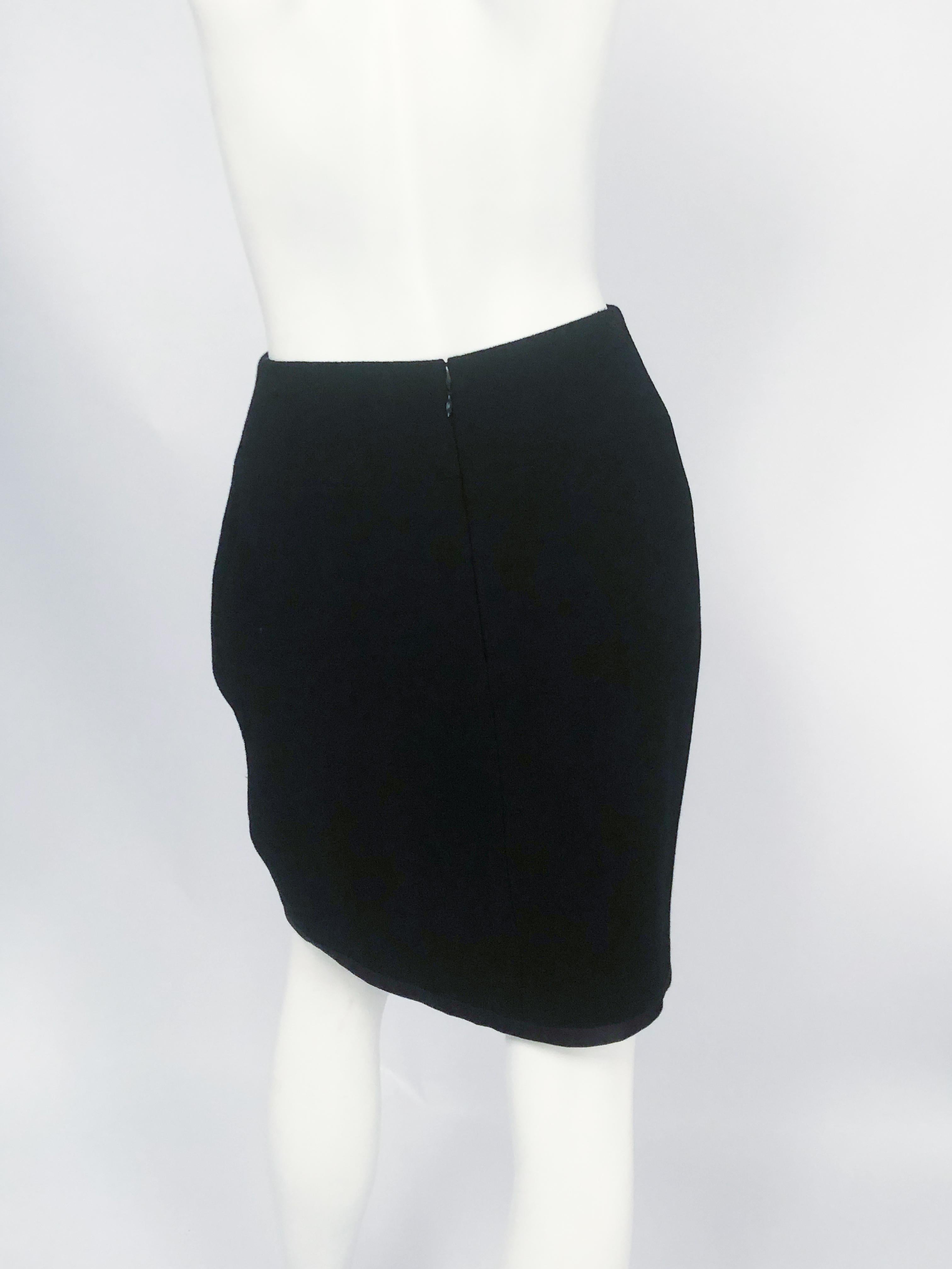 1990s Chanel Black Wool Skirt with Satin Hem and Silk Lining For Sale 1