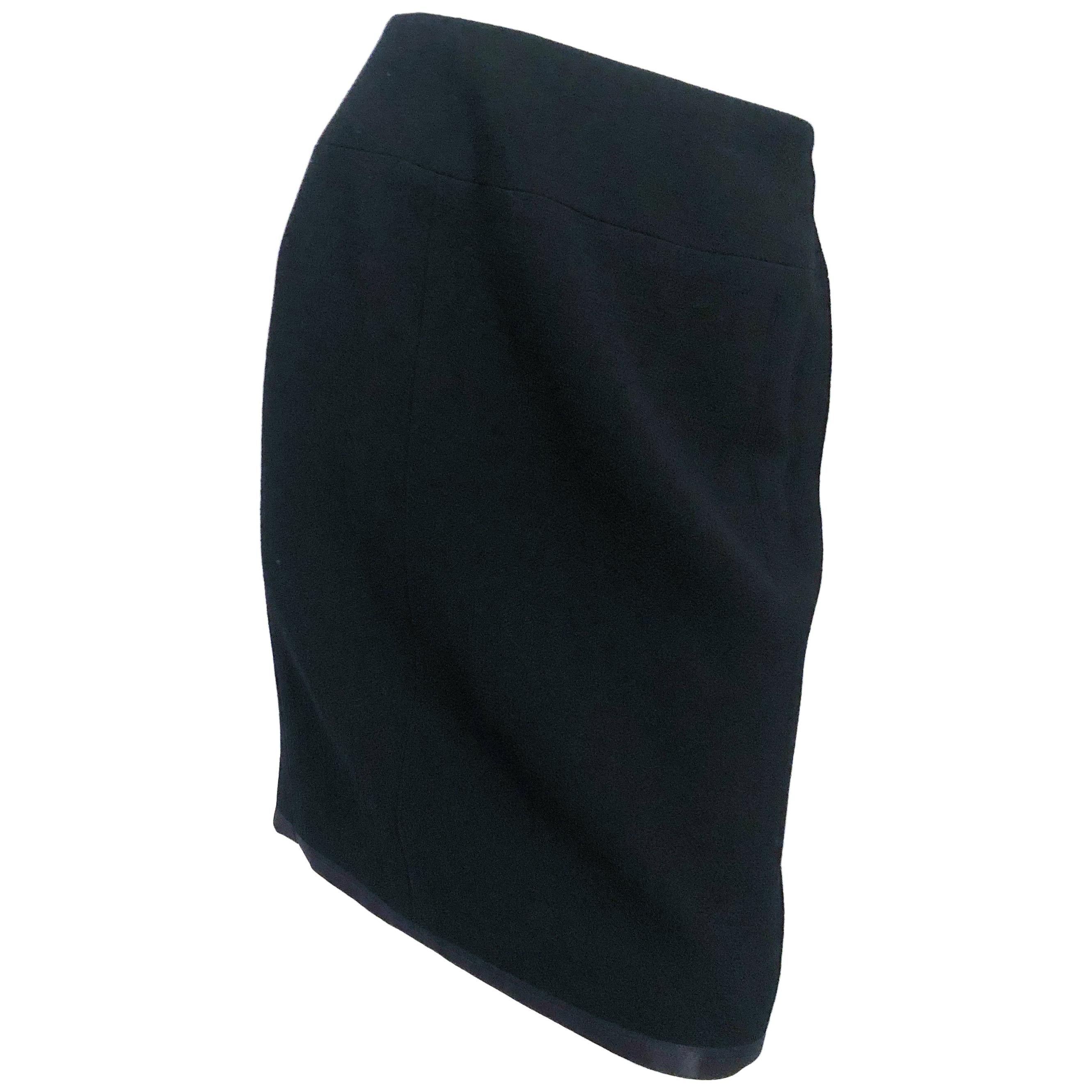 1990s Chanel Black Wool Skirt with Satin Hem and Silk Lining For Sale
