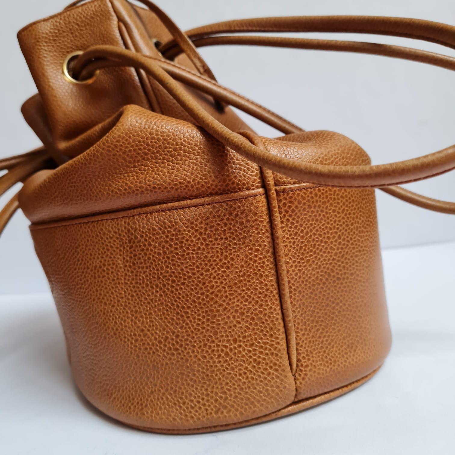 1990s Chanel Brown Caviar Leather CC Quilted Drawstring Hobo Bag For Sale 6