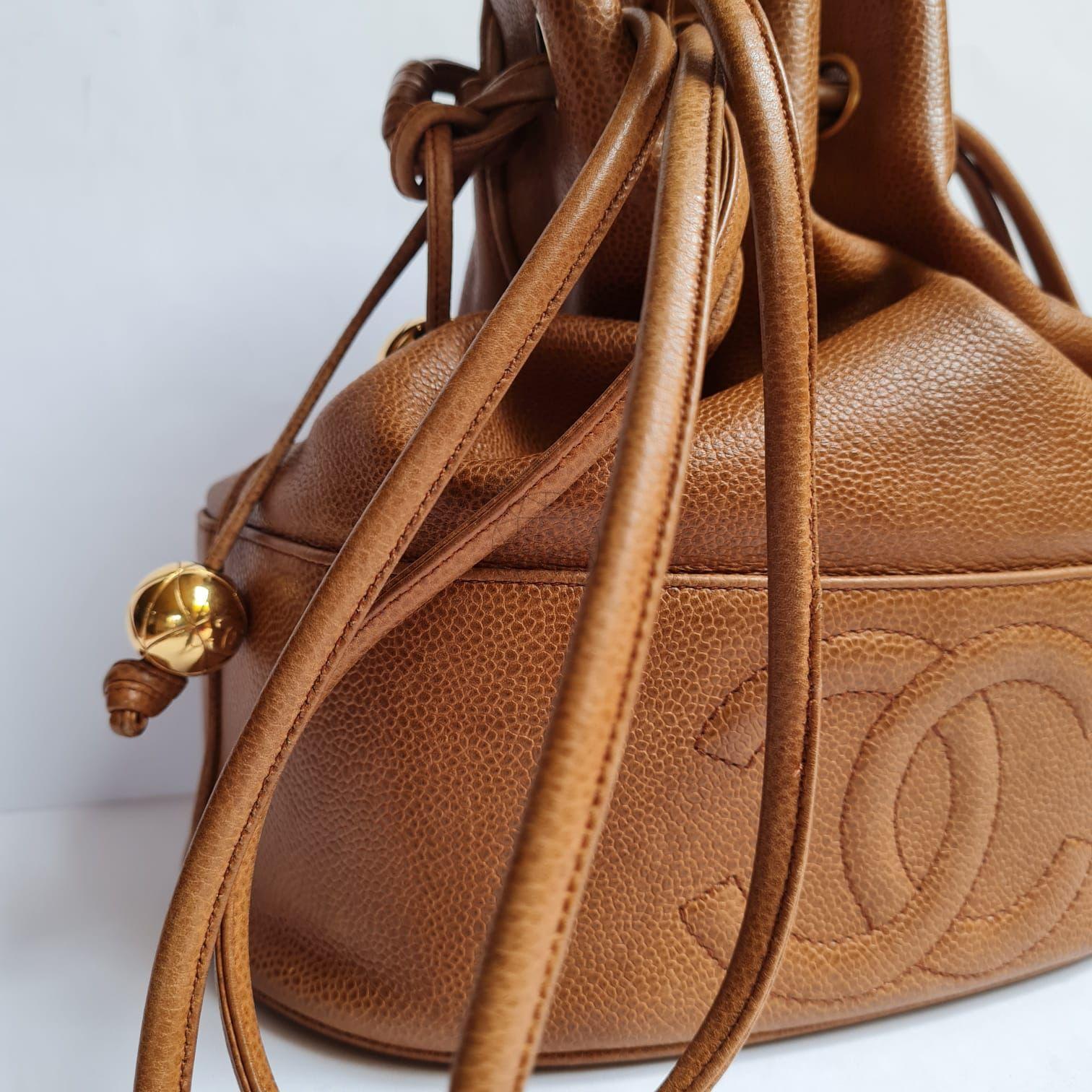 1990s Chanel Brown Caviar Leather CC Quilted Drawstring Hobo Bag For Sale 7