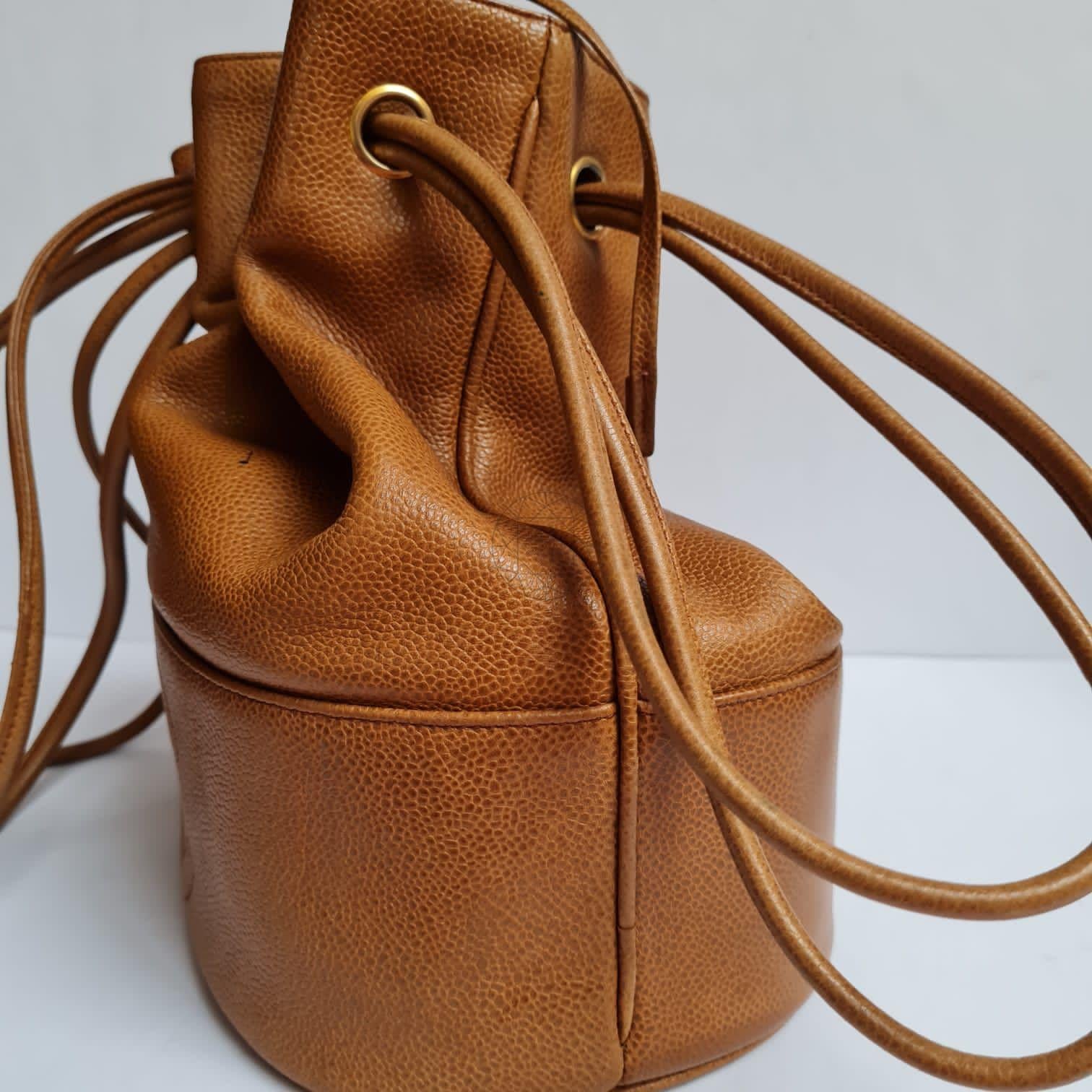 1990s Chanel Brown Caviar Leather CC Quilted Drawstring Hobo Bag For Sale 3
