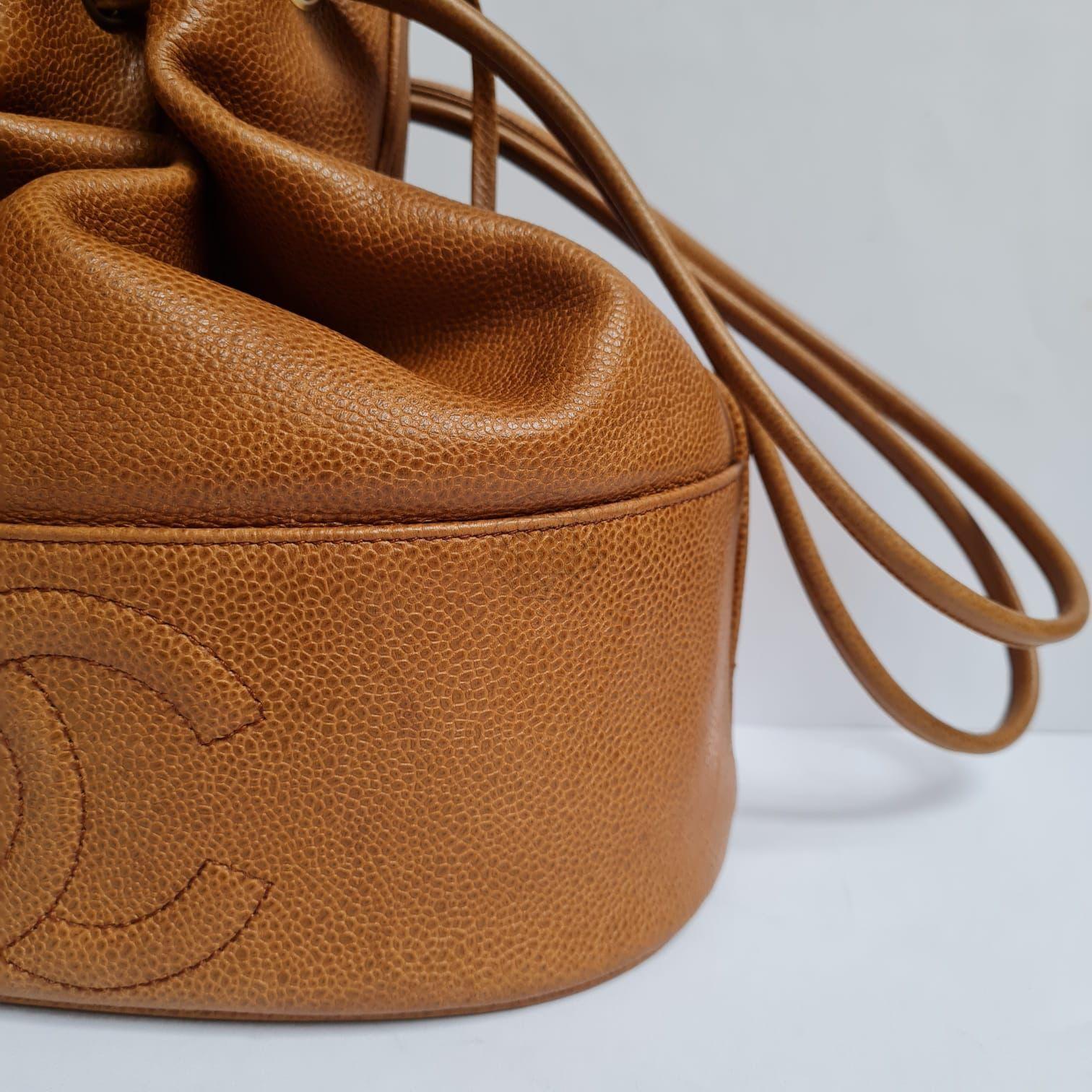 1990s Chanel Brown Caviar Leather CC Quilted Drawstring Hobo Bag For Sale 4