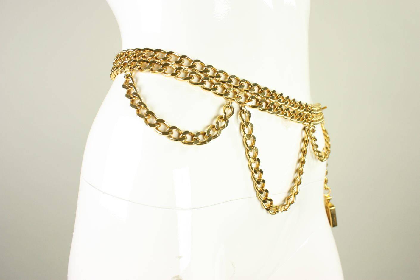 Vintage Chanel gold tone multi-strand chain belt with hook and eye closure and Iconic Coco Chanel No. 9 perfume bottle 5 1/2
