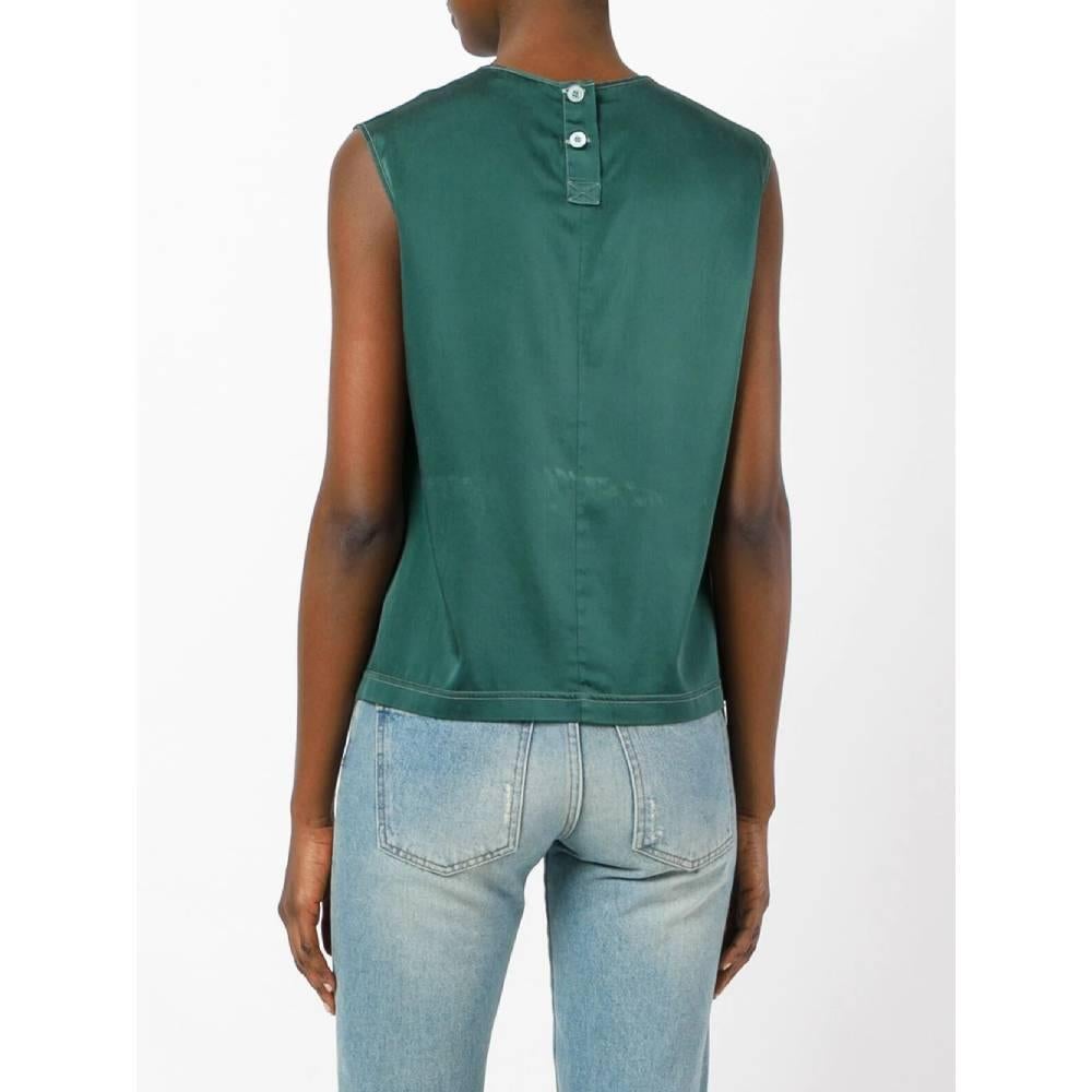 dark green sleeveless top