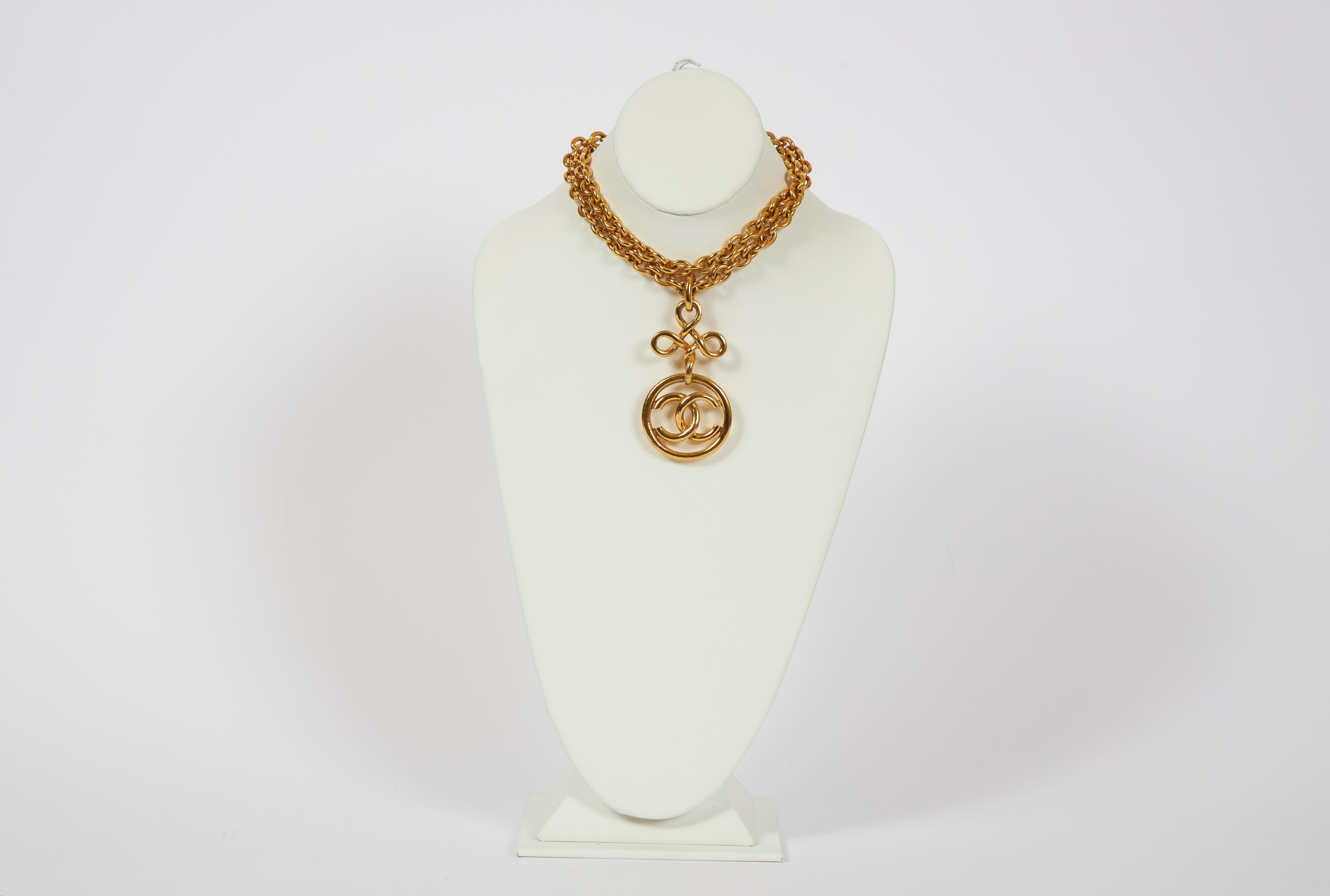 Chanel long goldtone metal chain necklace with a logo pendant. Spring 1993 collection. Pendant, 3.5