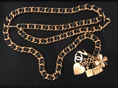 1990s Vintage Chanel Gold Toned Chain Leather Charm Belt Heart Clover Perfume