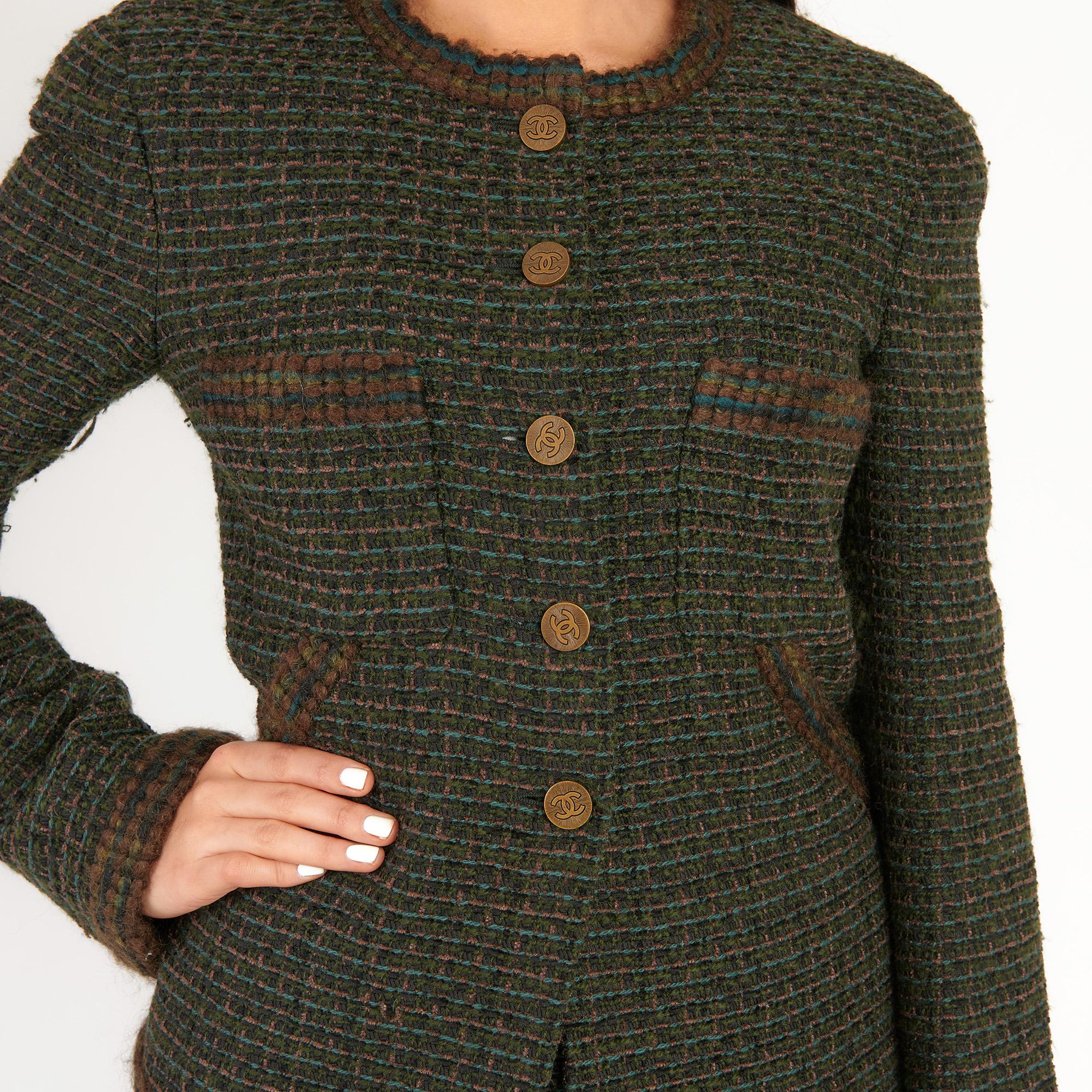 WAHF-C002
1990's Chanel Green & Brown Wool Tweed Vintage Skirt Suit

Jacket: EU 36 (UK 8) Skirt: EU 36 (UK 8) - Fits UK Size 6-8

Green & Brown 45% Wool, 30% Polyester, 20% Acrylic, 5% Nylon 

(Made in France)

This item is in excellent condition