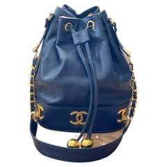 1990s Chanel ICONIC CC vintage navy blue drawstring bucket bag