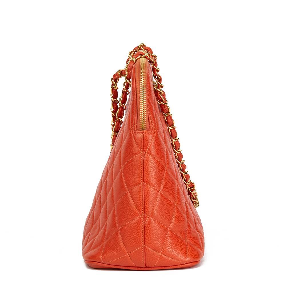 CHANEL
Orange Quilted Caviar Leather Vintage Timeless Shoulder Bag

Reference: HB1680
Serial Number: 4033387
Age (Circa): 1996
Accompanied By: Authenticity Card
Authenticity Details: Serial Sticker, Authenticity Card (Made in France)
Gender: