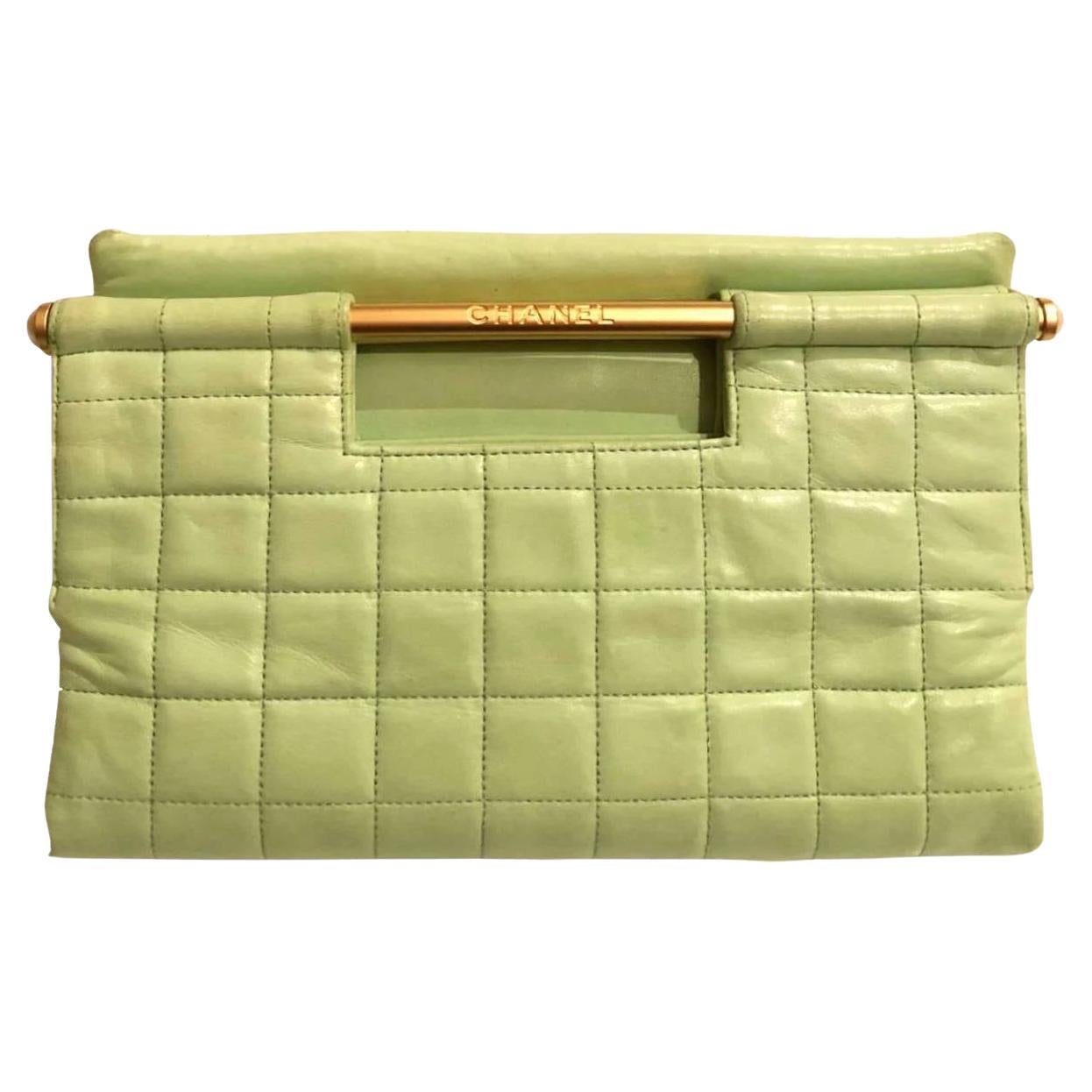 Vintage Chanel Mint Green (pastel light green) quilted top handle tote bag, matte gold handle with beautiful pearl stud edges, two separate purse opening slots with pearl pink color inside, internal pocket, lambskin 

Model: Chanel 5 series