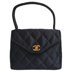 1990s Chanel Vintage Mini Quilted Top Handle Bag at 1stDibs