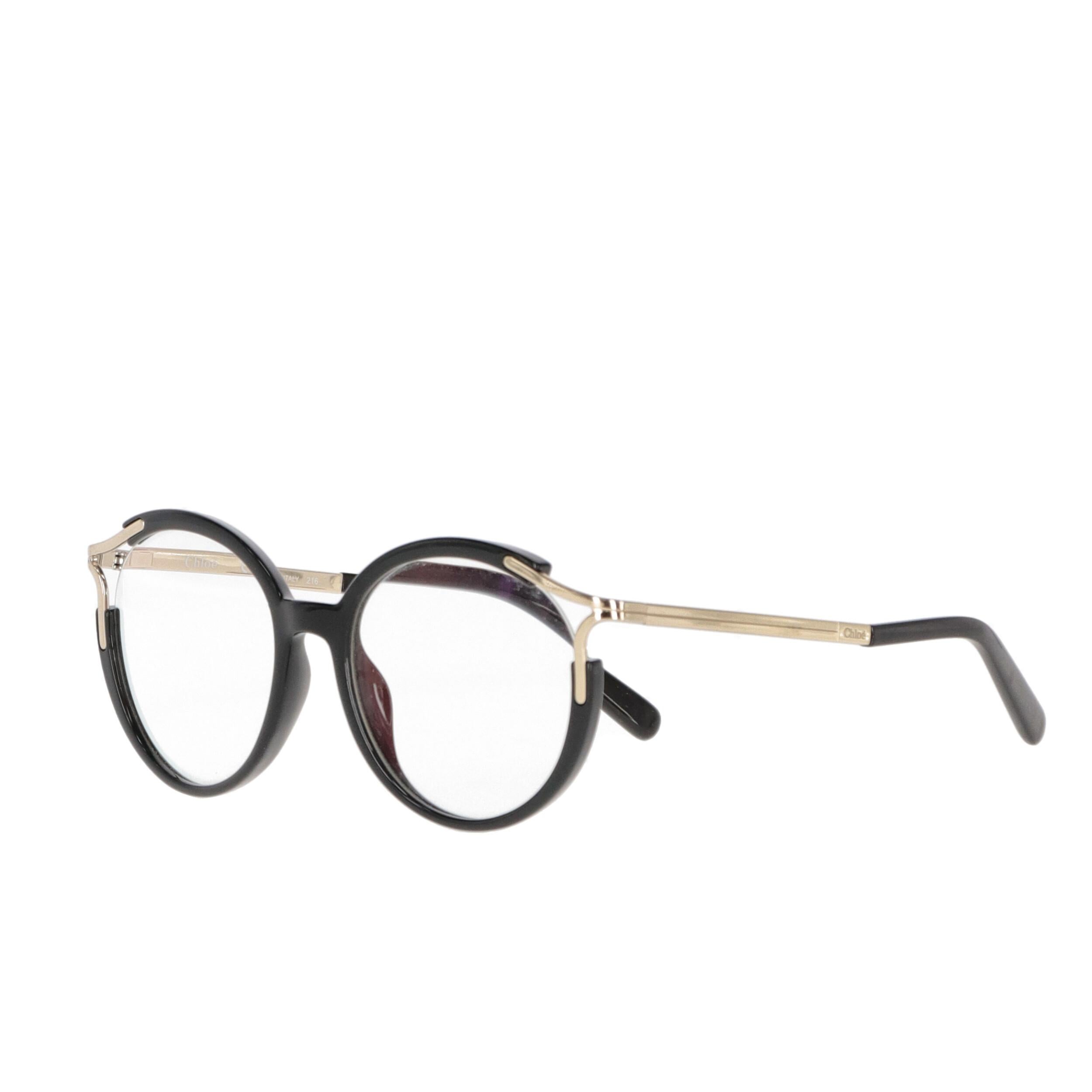 Chloé black acetate glasses with golden metal details.

The product shows some small scratches on the stems.

The lenses must be replaced.

Please note, this item cannot be shipped to the US.
Made in Italy

Years: 1990s

Width: 14 cm
Height: 5 cm