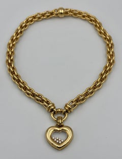 Colgante corazón Happy Diamonds de Chopard de los años 90 y cadena gruesa