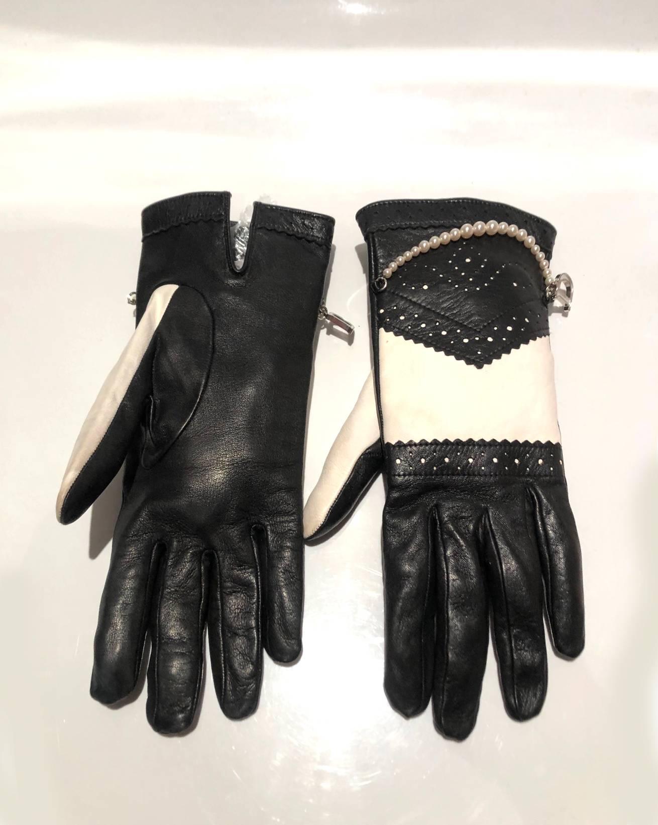 John Galliano for Christian Dior lambskin black ans white gloves, silk lining, white faux pearls, Dior silver tone charm, quilted details  
Condition: 1990s, John Galliano's era, very good, wear consistent with age 
Size: 7.5