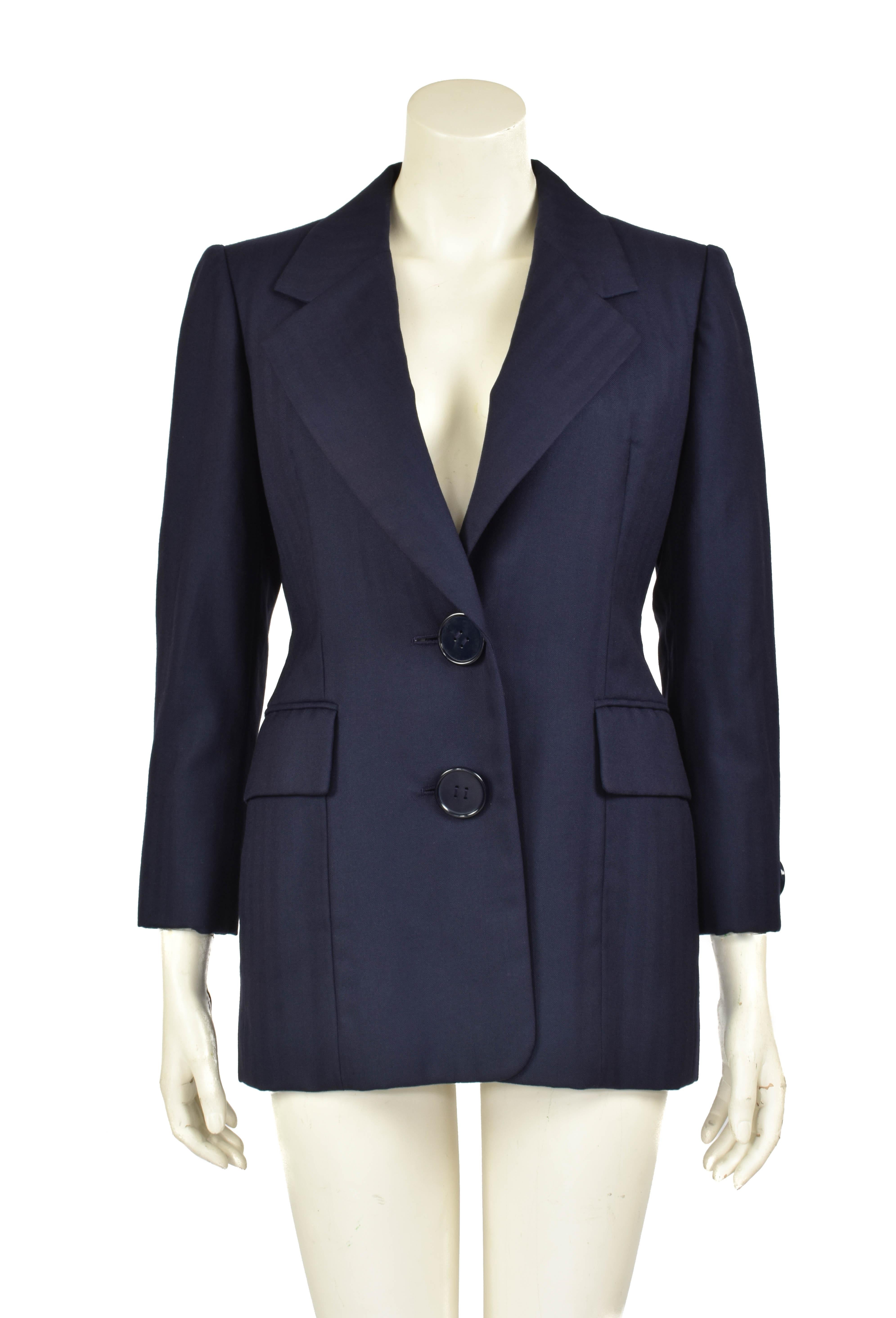 This beautiful jacket is a Christian Dior Haute Couture piece from the 1990's. It is has a fantastic shade of blue and extra large buttons. The wool shell is like new and there are only minor flaws on the silk lining. 

Size: Approximately S / US 6