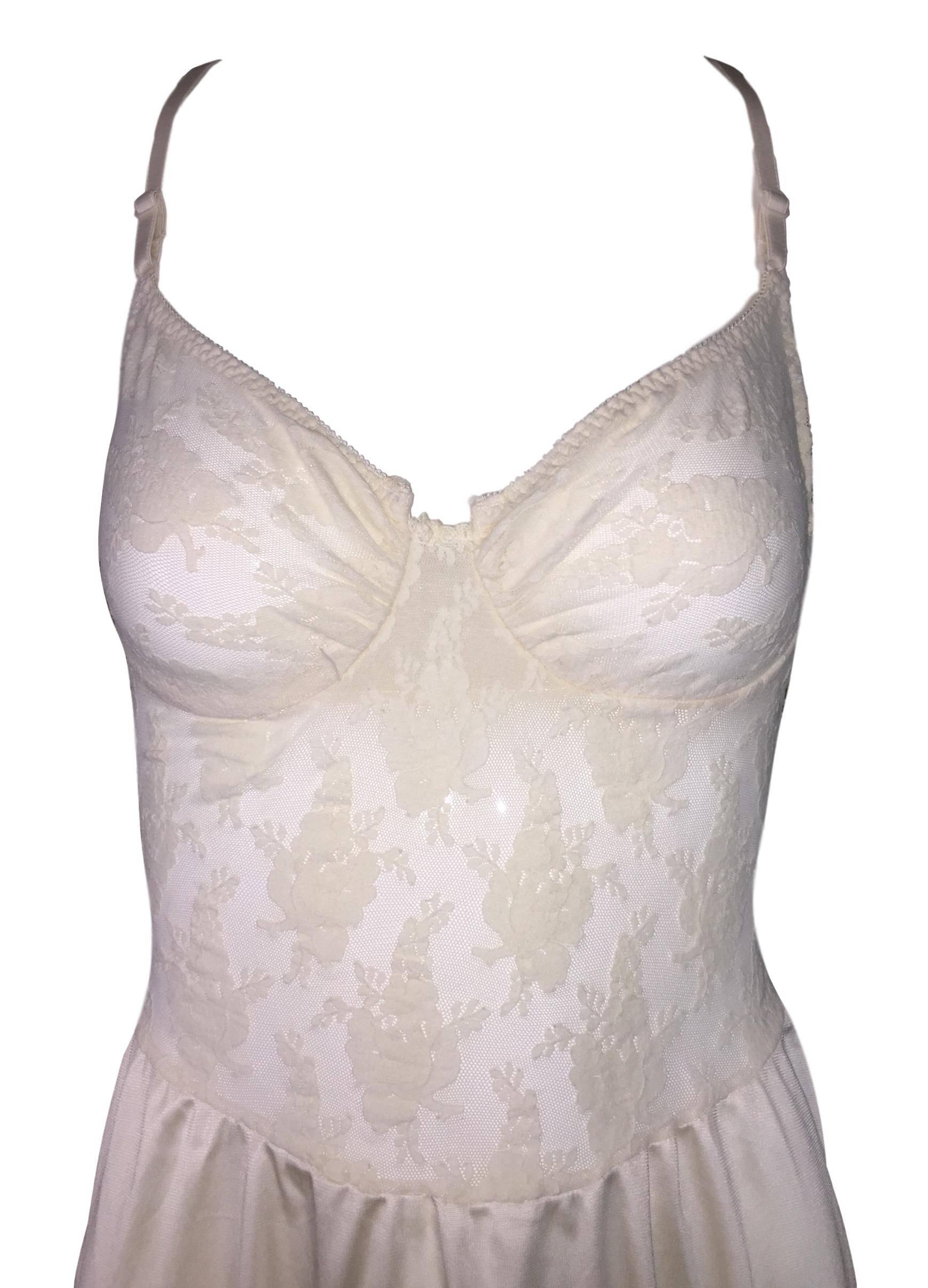 DESIGNER: 1990's Christian Dior

Please contact for more information and/or photos.

CONDITION: Good- no flaws!

FABRIC: 100% nylon

COUNTRY MADE: Dominican Republic

SIZE: 34B

MEASUREMENTS; provided as a courtesy only- not a guarantee of fit:
