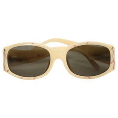 1990's CHRISTIAN DIOR plastic sunglasses with rose gold accents at temples