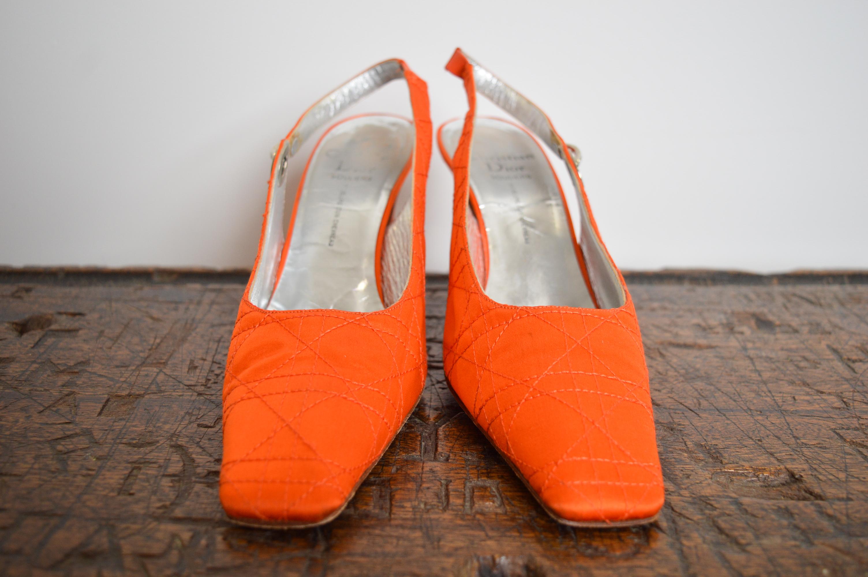 1990's Christian Dior Tangerine coloured Satin Jewel toned 'Cannage' Sling back 
square Toed heels !

Features;
Iconic Cannage embroidered Satin texture
Silver Leather lined interior
Leather Sole
Original Box & Dustbag
Swarovski detail Chrome