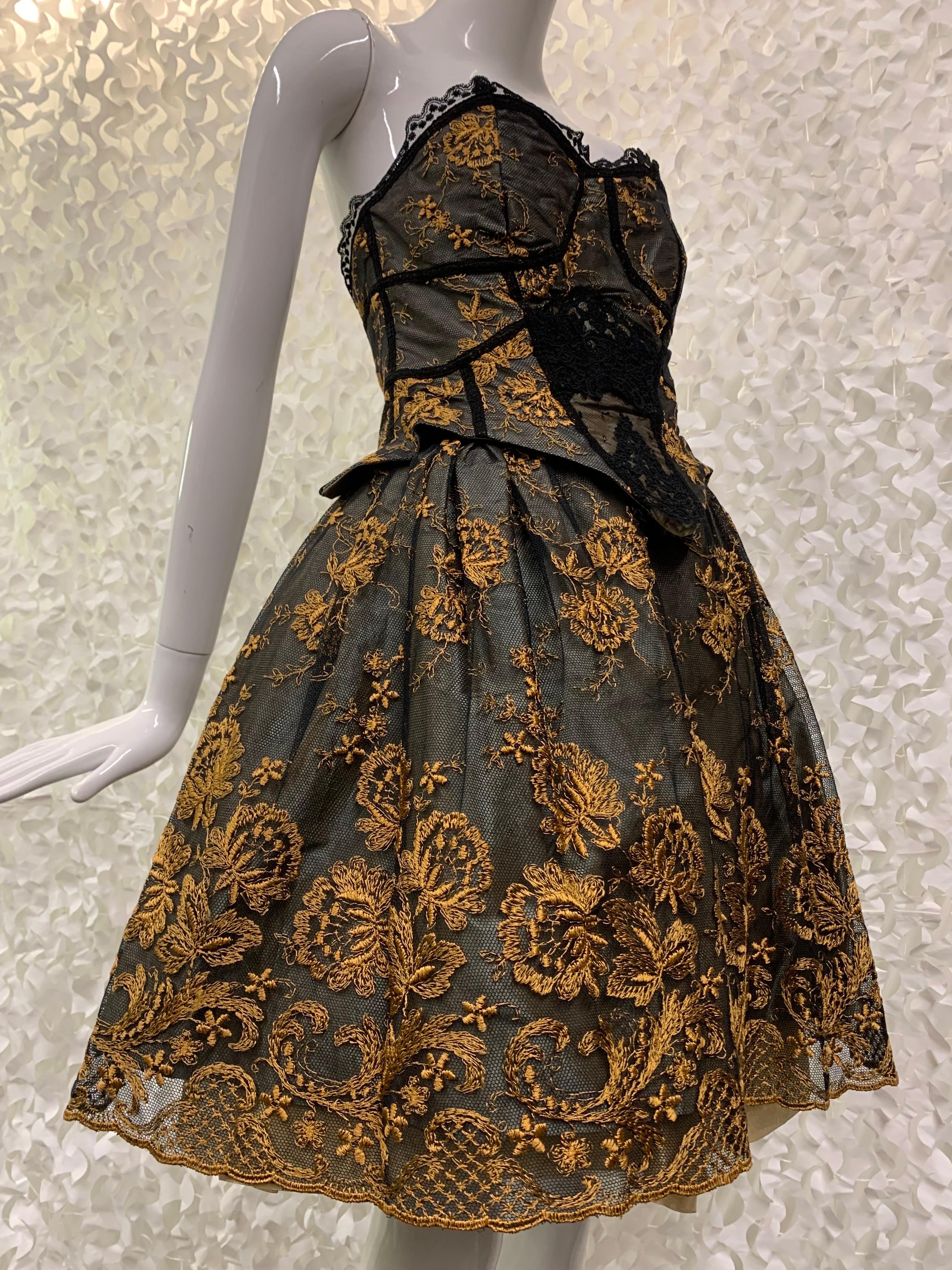 1990s Christian LaCroix Strapless Merry Widow Dress w Pouf Skirt in Black Lace and Gold Embroidery 

A fantastically iconic LaCroix that features a 