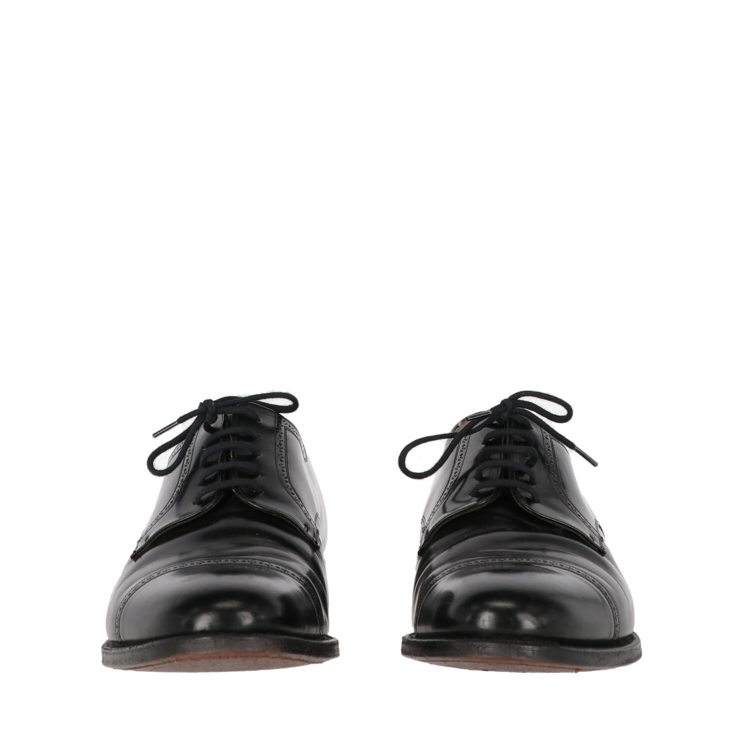 black shoes with brown laces