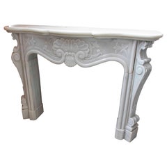 1990s Classic Carved White Marble Fireplace – French Decorative Style