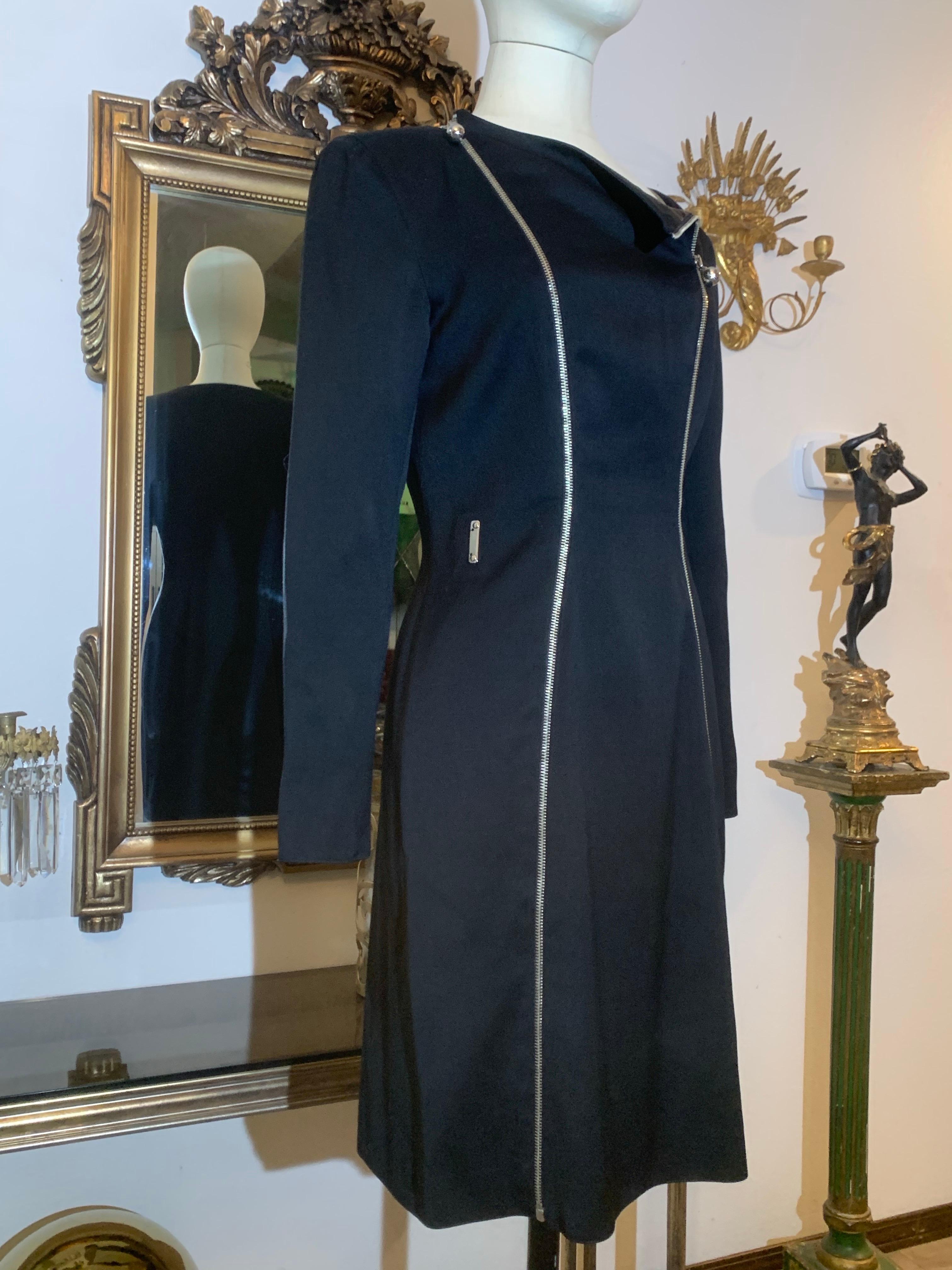 1990s Claude Montana Black Wool Gabardine Fitted Chrome Zippered Sheath Dress:  A simple dress in a form-fitting shape with 2 parallel zippers extending from shoulders to hem. Tapered zippered cuffs. Lined in acetate. Boat-neck, knee-length. EU size