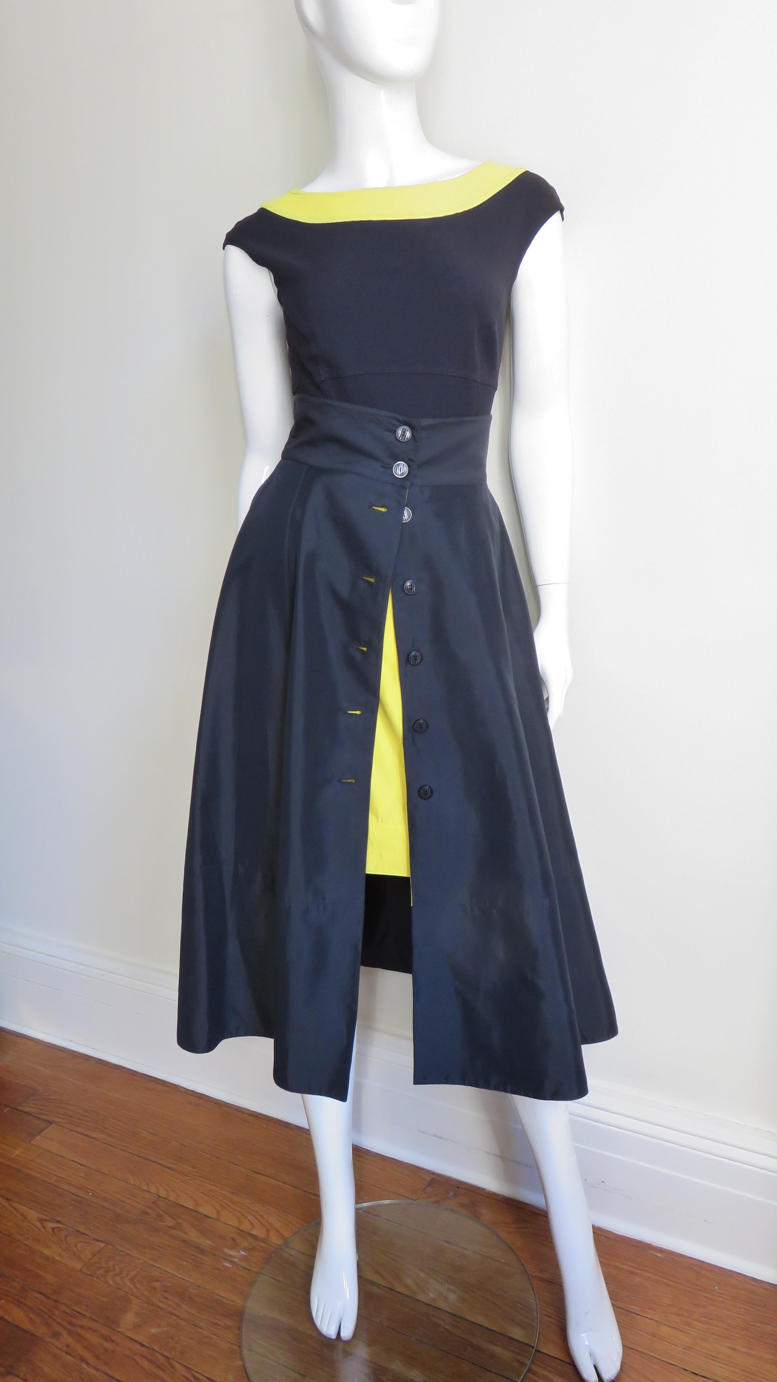 A fabulous silk/cotton blend set from Claude Montana in bright yellow and black.  The 3 piece set consists of a yellow pencil skirt with top stitching detail around the hemline, a full button front mid calf length skirt black skirt with a matching