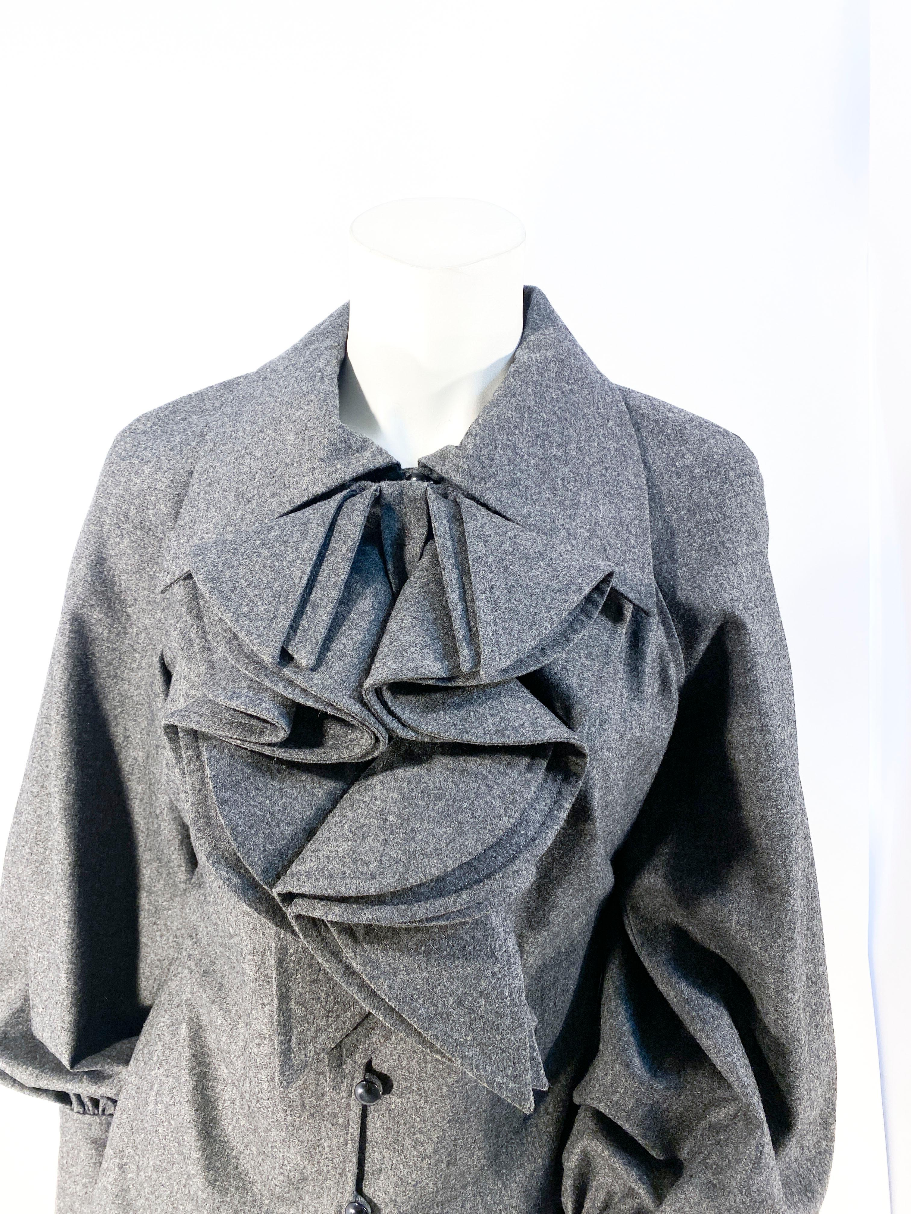1990s Colleen Quen charcoal grey wool shirt with billowed bishop sleeves, a three buttoned front closure, fitted bodice and a matching removable wool jabot that is full and layered. 