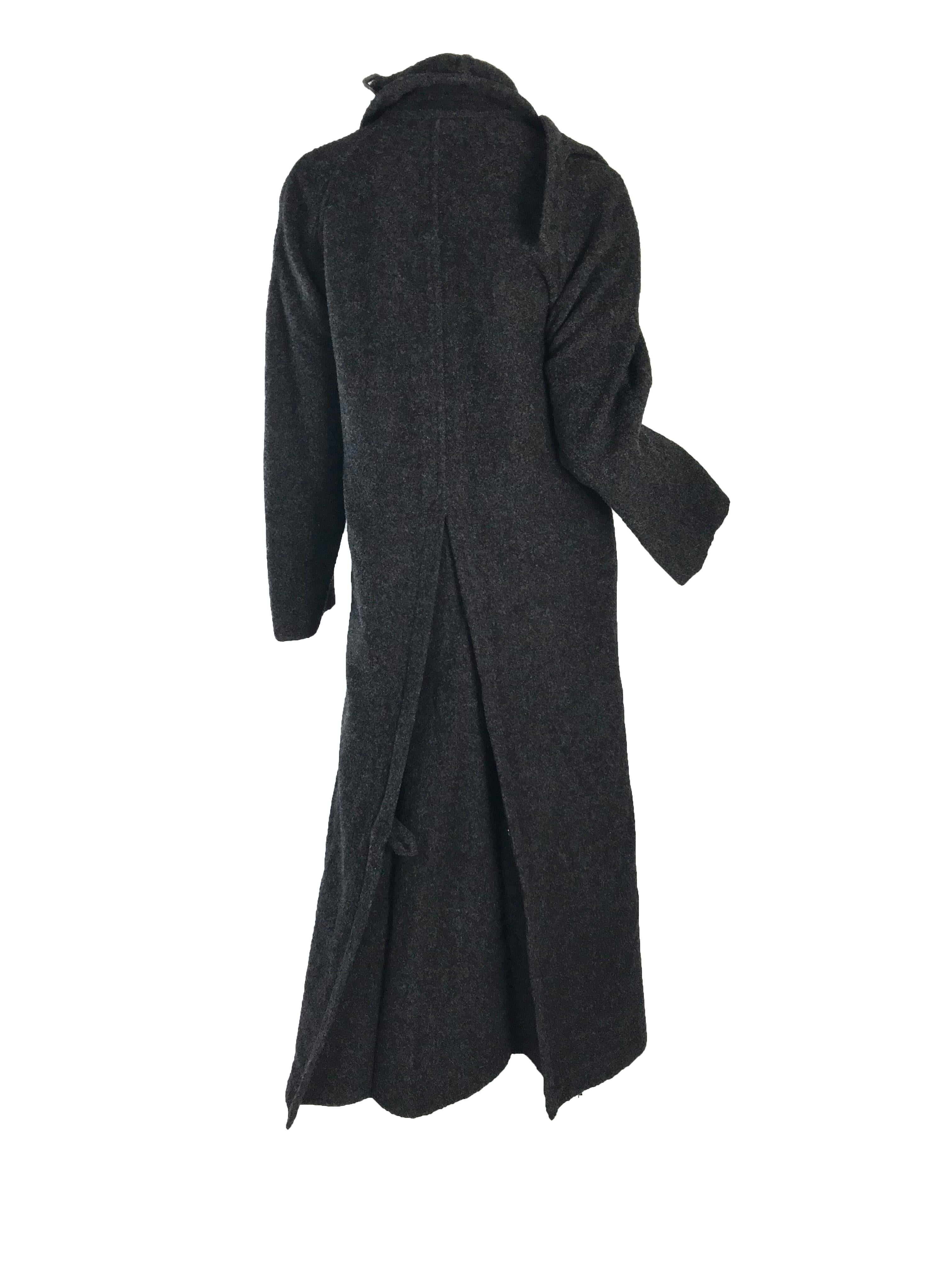 1990s Comme des Garcons oversized black wool coat with hook / eye closures. 

Condition: AS IS, multiple moth nicks
Made in Japan
Size M