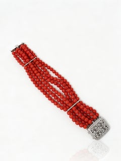 1990 Bracelet multibrins en or 18 carats avec perles de corail et diamants