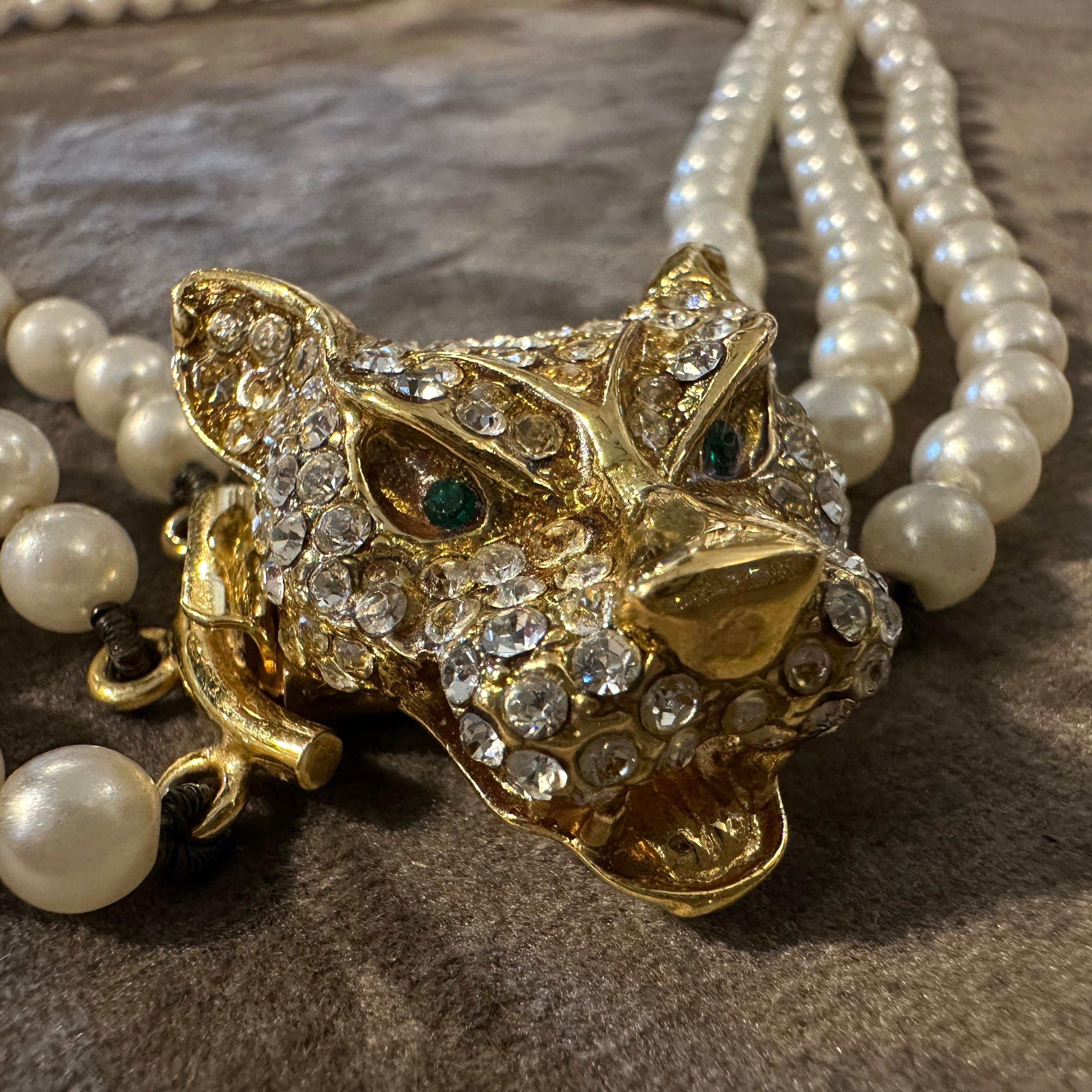 Striking 1990s Bijoux Cascio Gold-Toned Panther Head & Multi-Strand Pearl Necklace
Unleash your inner wildcat with this magnificent vintage necklace by Bijoux Cascio, a prominent Italian costume jewelry maker, dating from the 1990s. 
The necklace