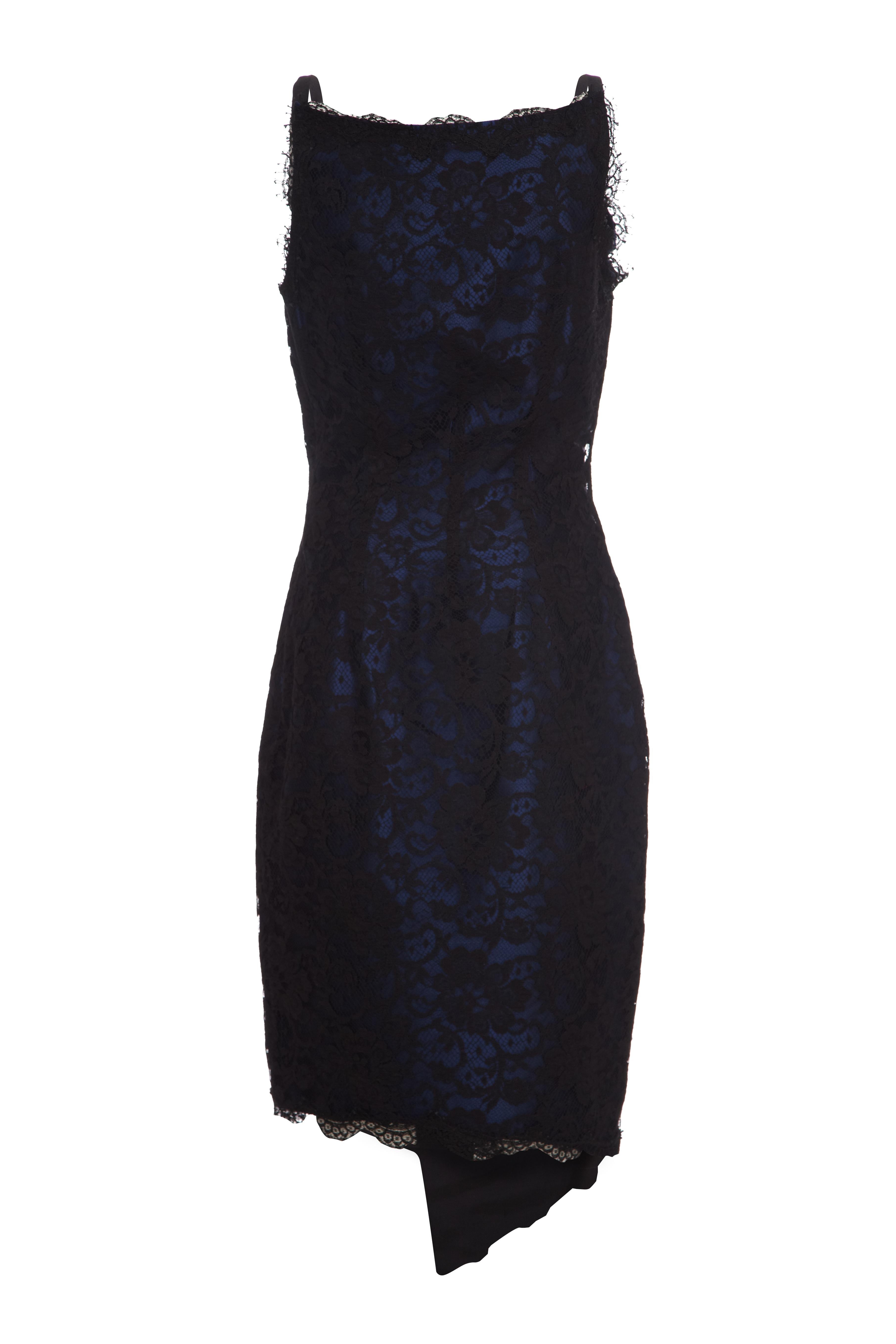 This desirable 1990s black lace cocktail dress with blue silk underlay is couture by British designer David Fielden and exudes quality. A favourite of figurative icons such as Elizabeth Taylor, Julia Roberts, Bette Midler, Bianca Jagger and Kate