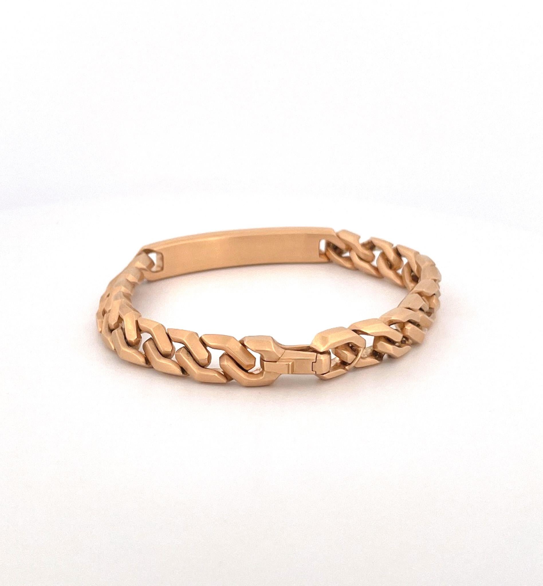 From designer David Yurman, circa 1990s, 18 karat yellow gold name plate bracelet. This bracelet is crafted with 9 MM brushed finish plate set along an 8-inch chain. This bracelet is a part of the Eiseman Estate Jewelry Collection.